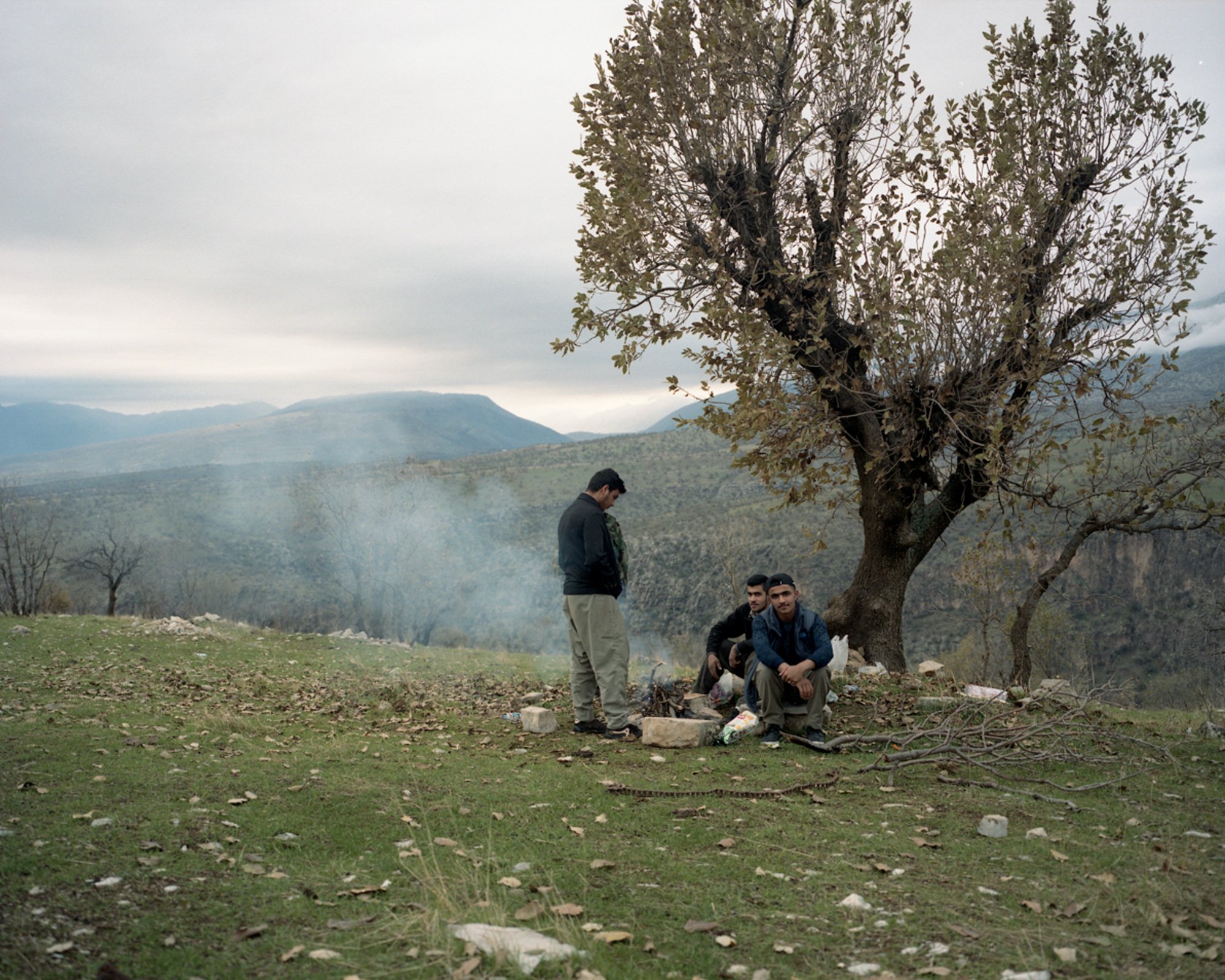  Kurdish men having a picknick at Chama river valley. Barzan, Iraq. 