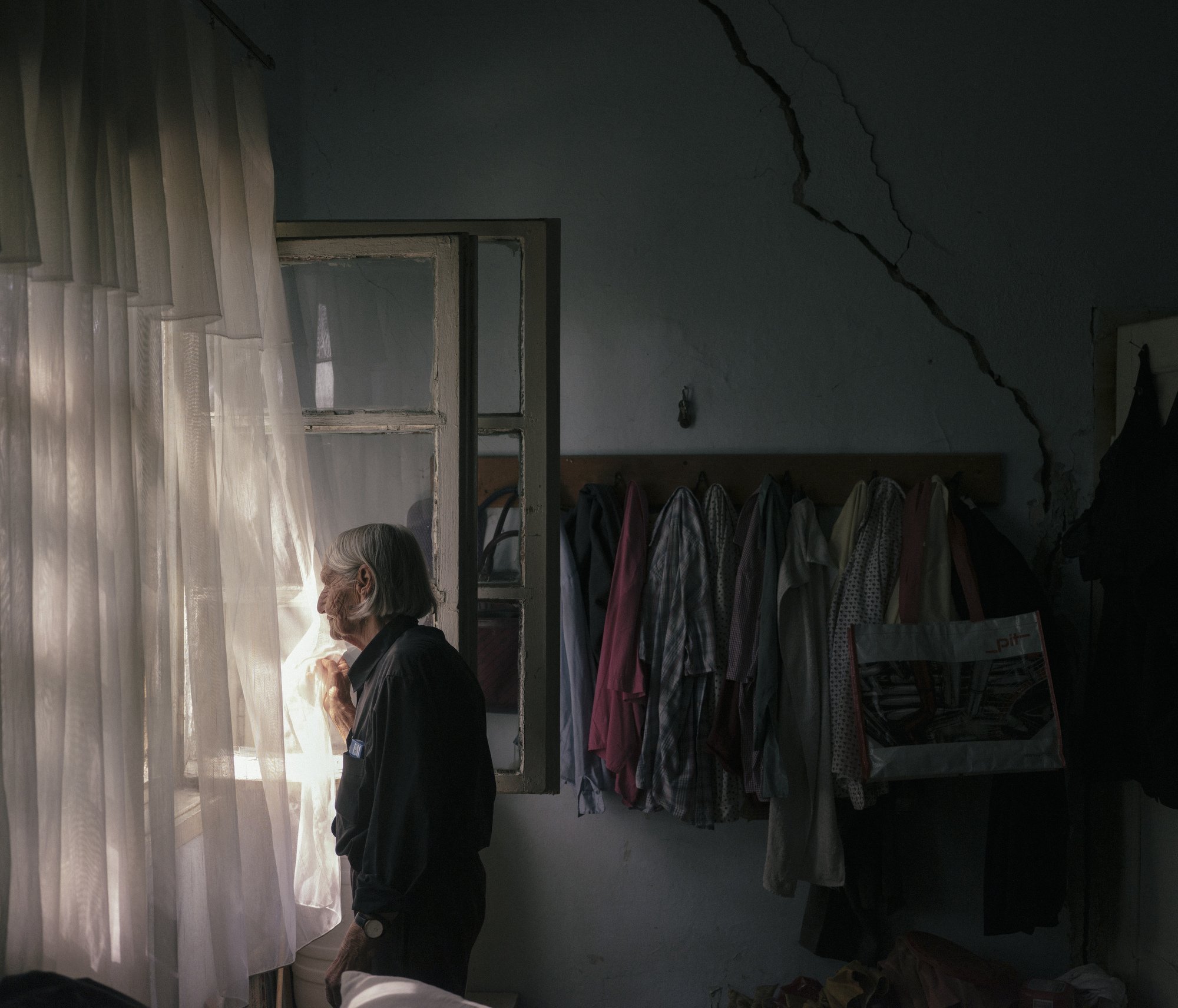  MINES IN JAMA. Portrait of Roksanda Tasic, 84 old, she lives in poor neighborhood of Bor, approx. 5-10 minutes from the city centre of Bor. Roksanda lives in a small house with a lot of apparent cracks in the walls of the house, which she says is fr