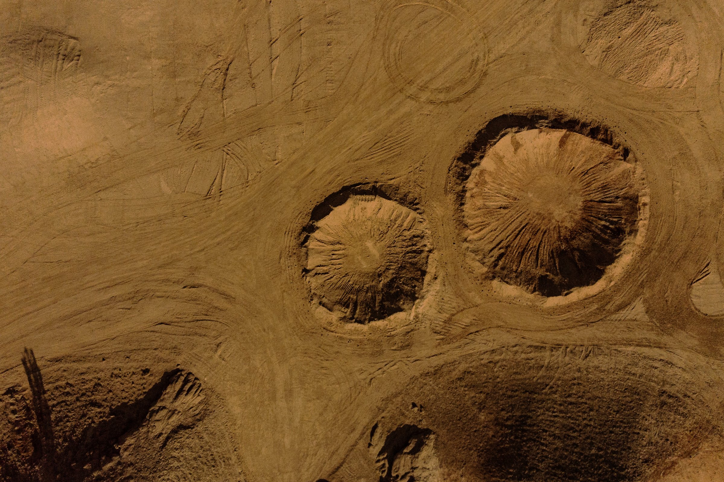  An aerial view of the man made craters next to the C Space in Gobi desert, some 40 km from Jinchang in China's northwest Gansu province. The craters are right next to the first Mars simulation base in China.  