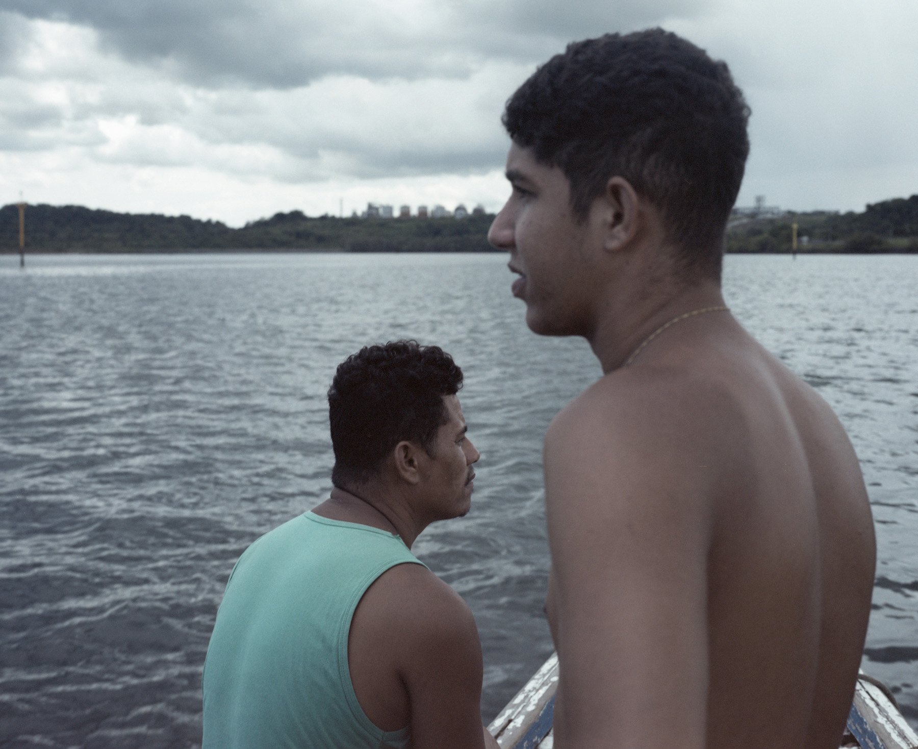  Candeias, Bahia, Brazil., 2022. Davi and Elaine’s husband fish in the waters near the Quilombo. “Boca do Rio” was community of 6000 people, since the building of the commercial port of Aratu, that surround the Quilombo”, the population dramatically 