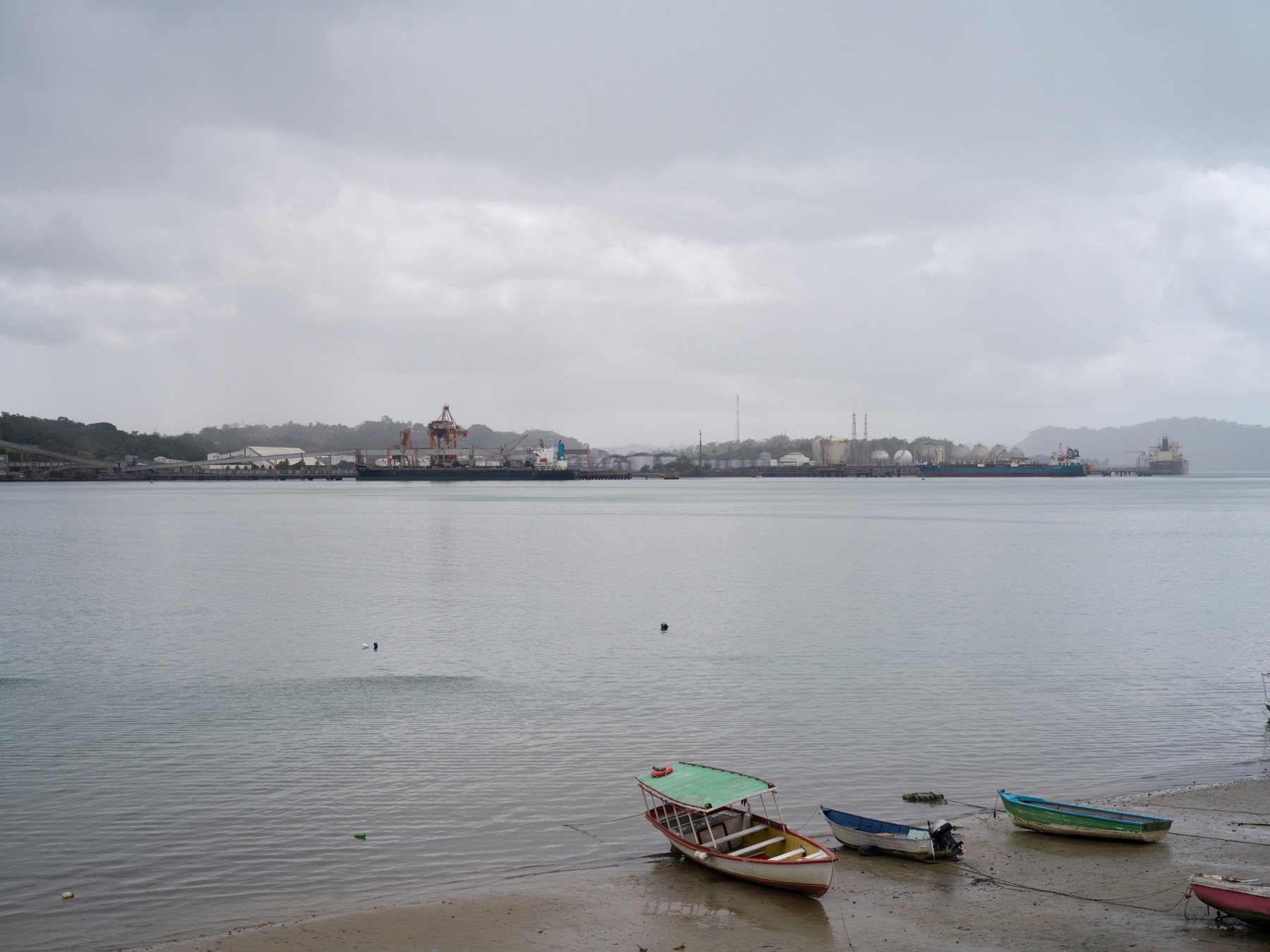  Ilha da Maré, Bahia, 2021. A view of the Aratu Port from the Ilha da Maré. The Aratu-Candeias Port that is responsible for the 60% of the cargo ship travelling from and to the Bahia State. With an increase of the industrialisation, increased also th