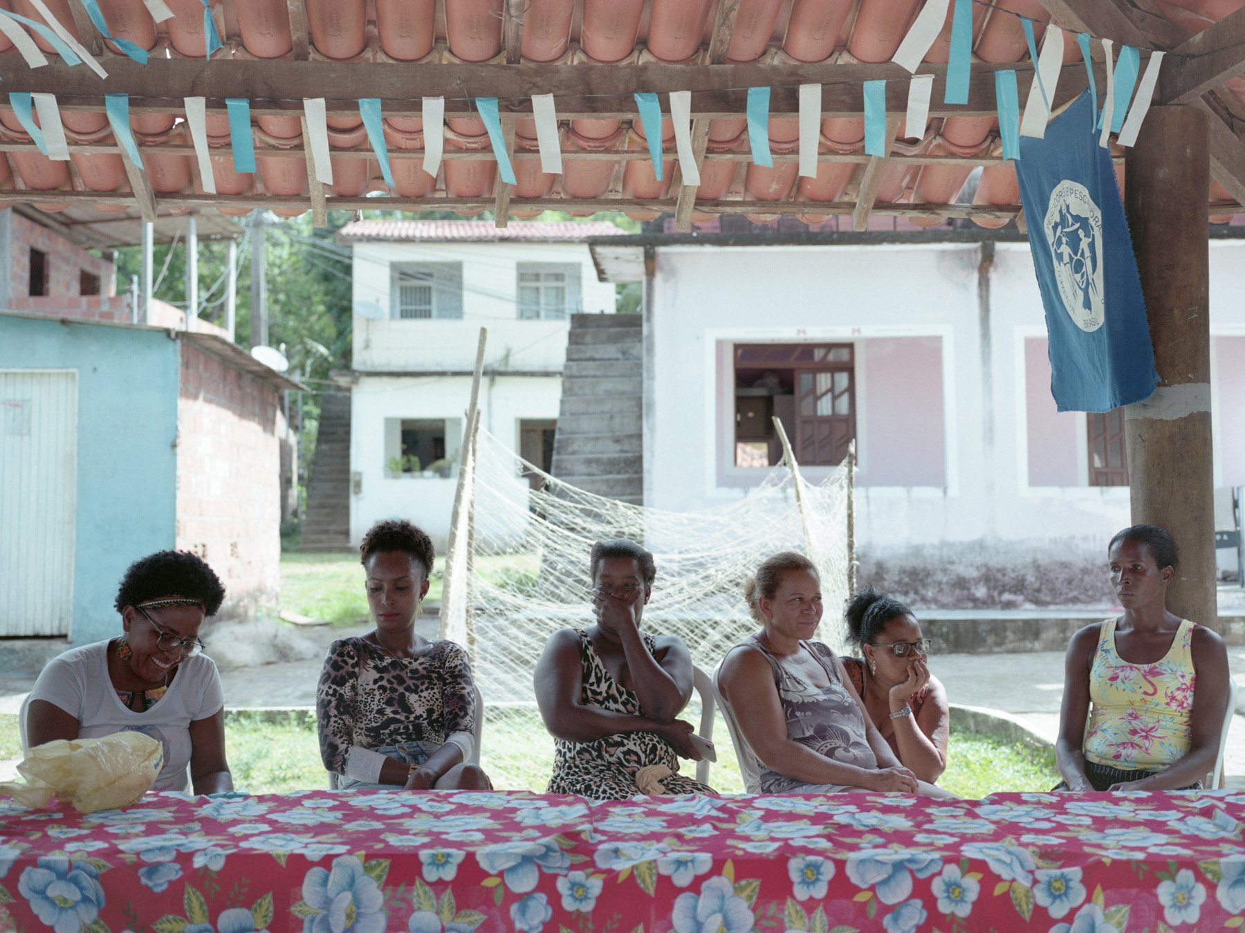  Ilha da Maré, Bahia, 2020. A group of fisherwomen during a meeting of the Community. The leaders of the Quilombo of Ilha de Maré are mainly women and are the ones that fish and catch seafood. Because of the high petrochemical pollution their still o