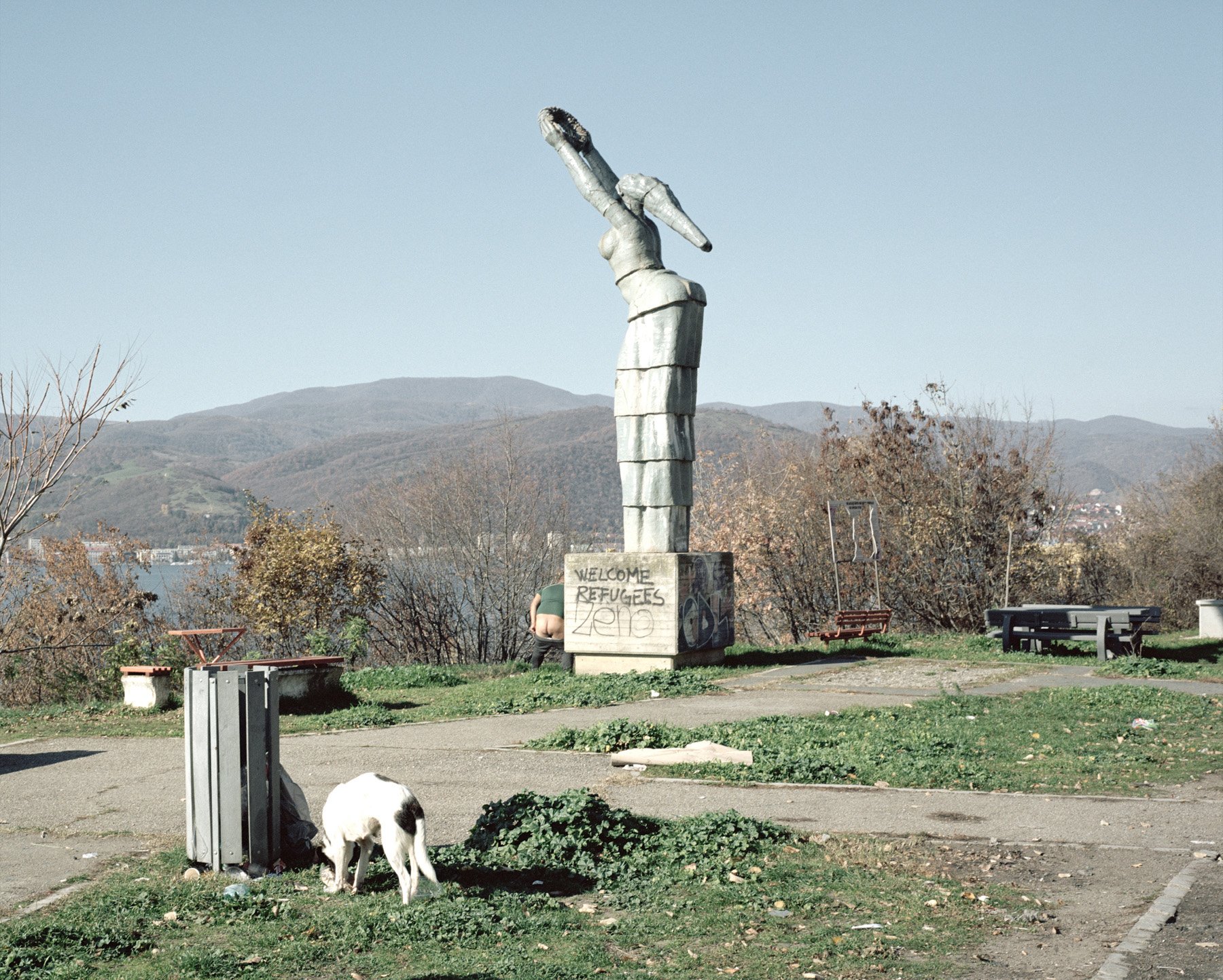  Romania, Orsova. 2016. A communist style monument with a wrote welcoming refugees. 