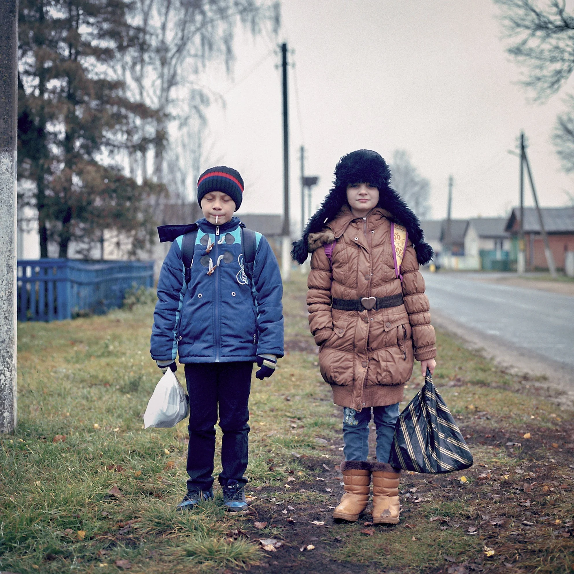  Walking home from school in Vetka, on the edge of the Belarusian Chernobyl Exclusion Zone. (1986) 