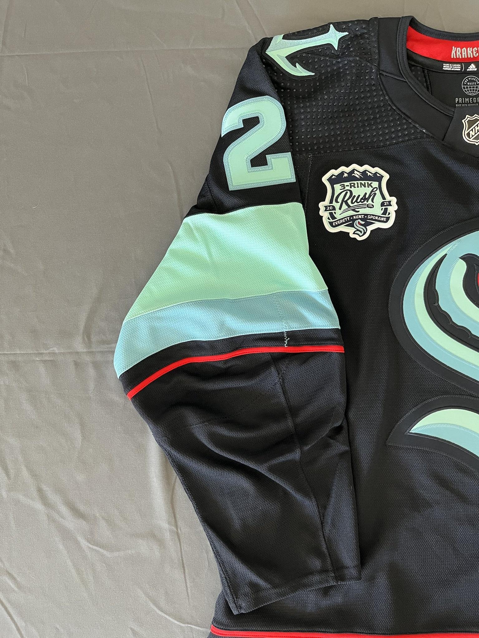 Seattle Kraken Green Night warm up jerseys auction table (game vs Colorado  Avalanche 4/20/22) 