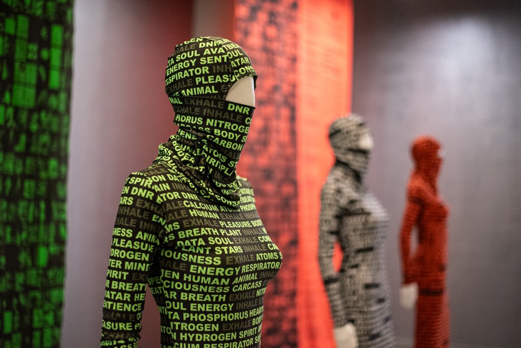  Signs of Life | INHALE / EXHALE (2020-2023) Artist: Balaklava, turtleneck, skirt, and socks made from neon green recycled polyester with monotone digital print, by  Elaine Young.  Image Credit: On White Wall 