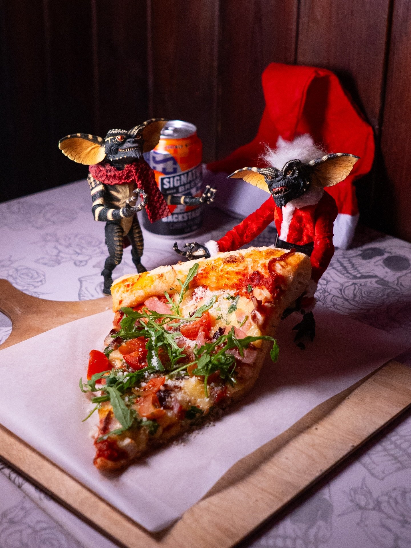 Great. Our elves have morphed into mischievous hostile pizza gremlins. We're officially cooked.

Come rescue a mega slice from our @voodooshowroom window before they devour everything!!🍕
