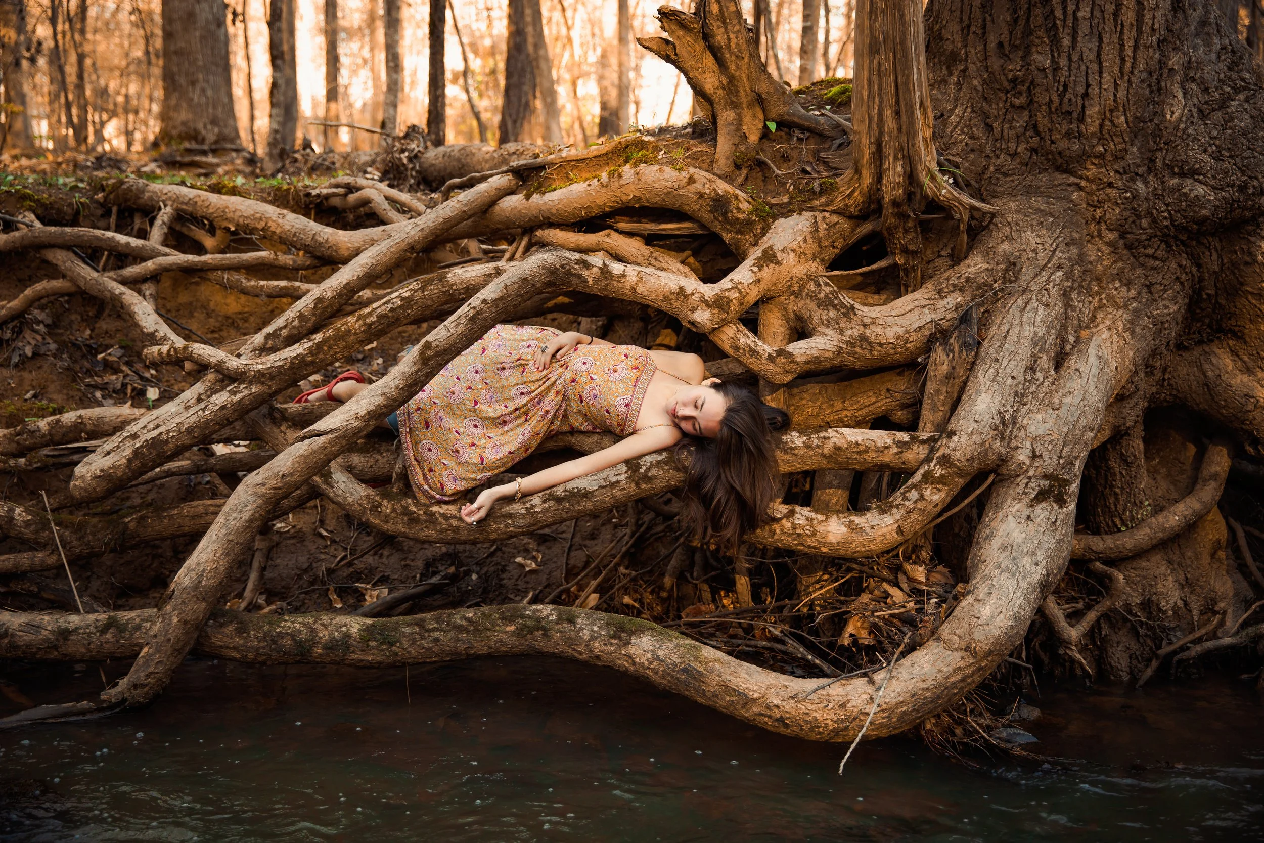 Girl in Tree Roots .jpg