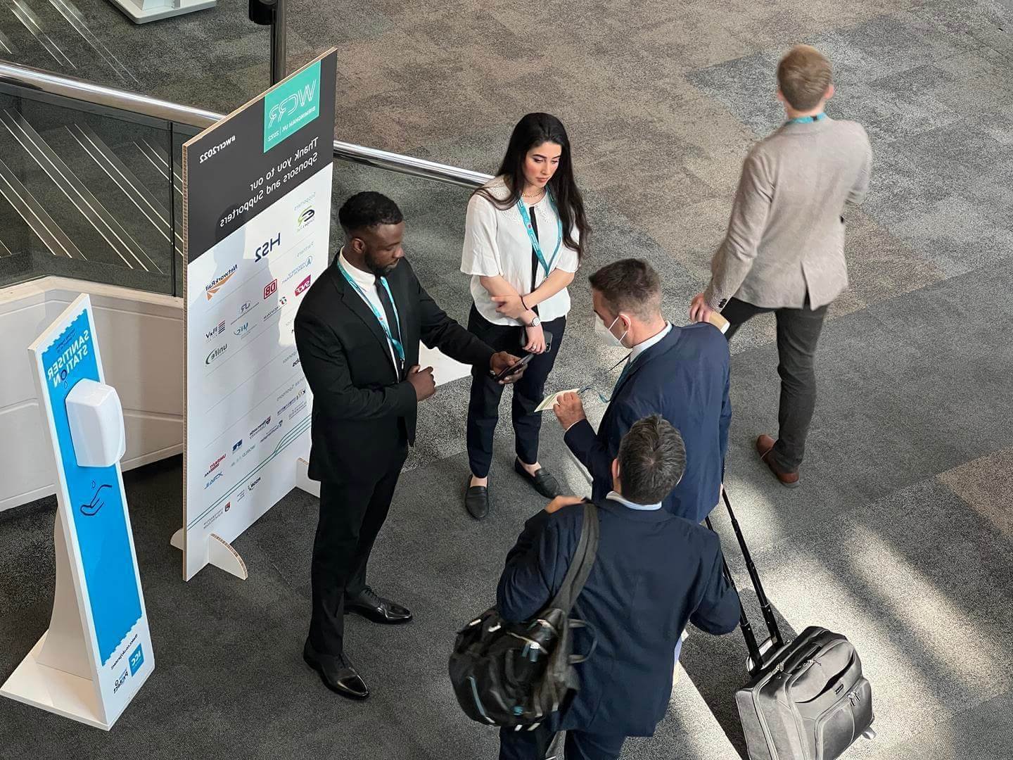 Barcode scanning of event badge using mobile device, enabling real-time tracking of session attendance, exhibitor leads, and attendee movement.