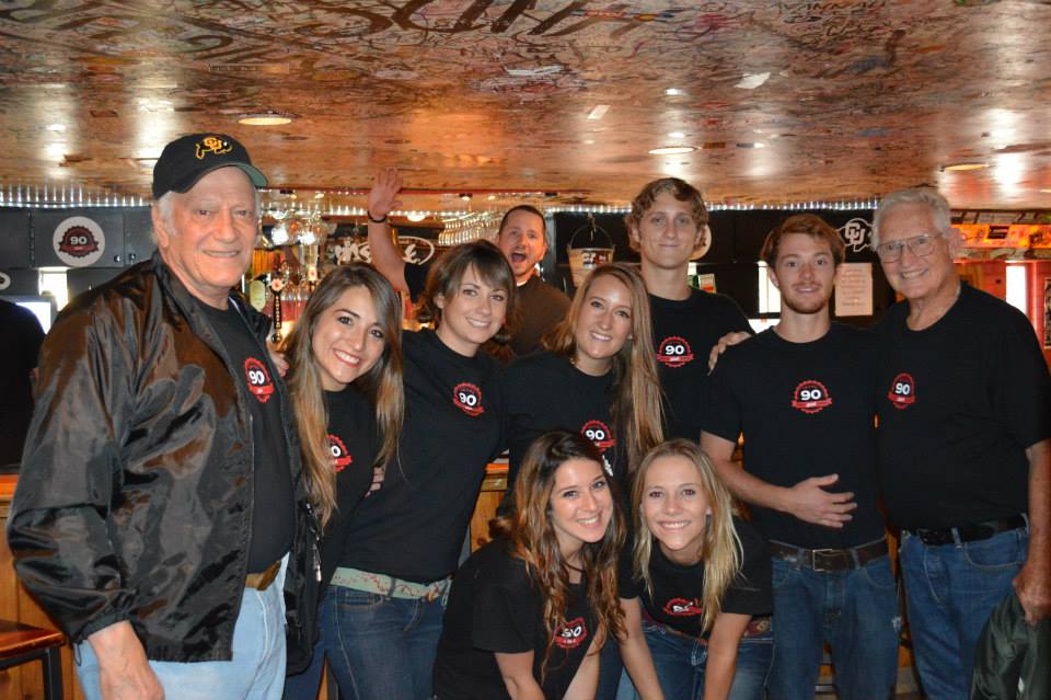 Sink staff and patrons wearing their limited release Sink t-shirts celebrating 90 years in business