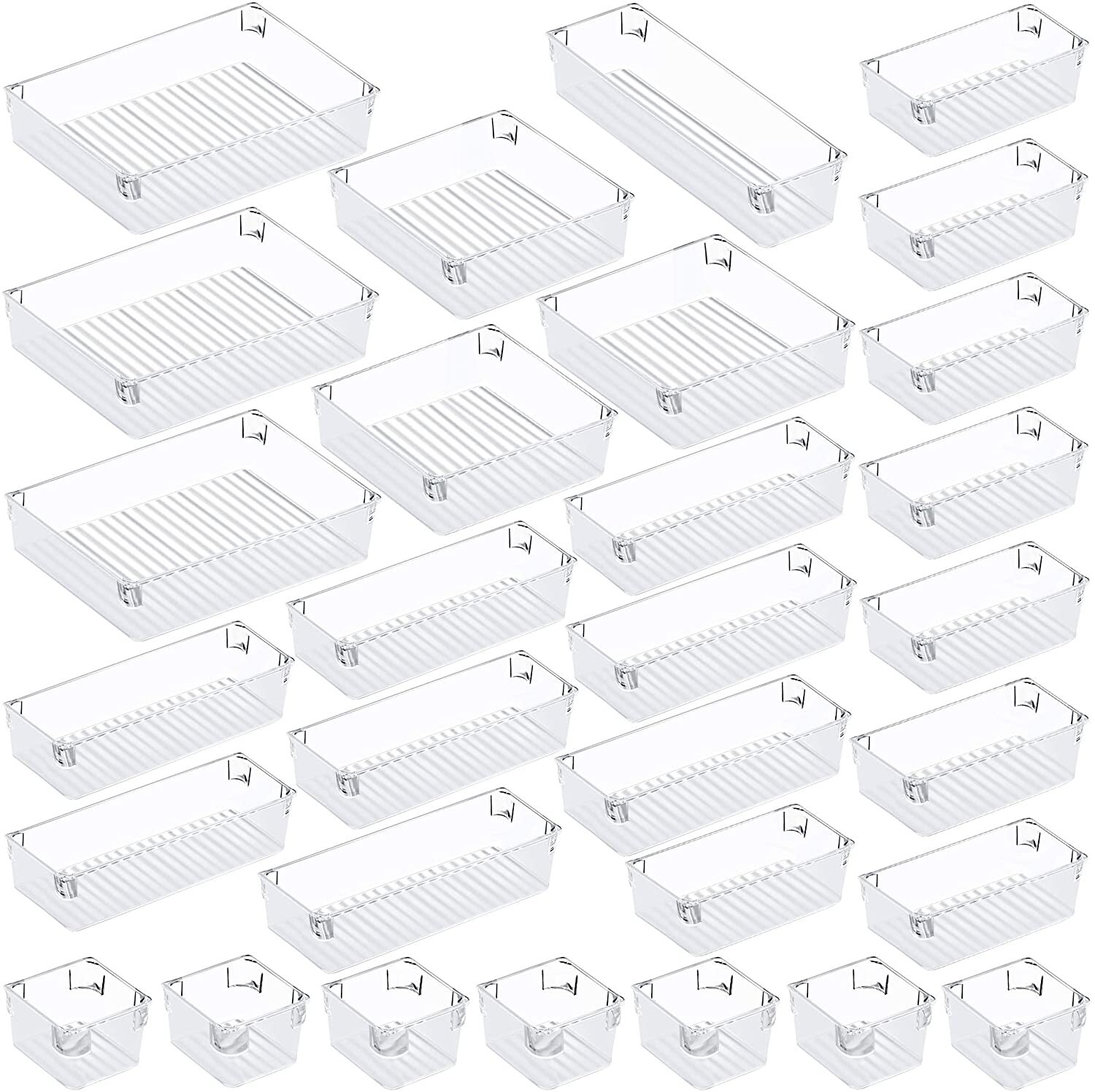 https://images.squarespace-cdn.com/content/v1/5d028b8cbcf64e000159162b/1621627167890-LVKGDKVKWDDWLQ3E8ZAJ/Puroma+31-pcs+Desk+Drawer+Organizer+Trays%2C+5-Size+Large+Capacity+Plastic+Drawer+Storage+Bins+Kitchen+Drawer+Organizers+Bathroom+Drawer+Dividers+for+Makeup%2C+Kitchen+Utensils%2C+and+Jewelries+-+Clear