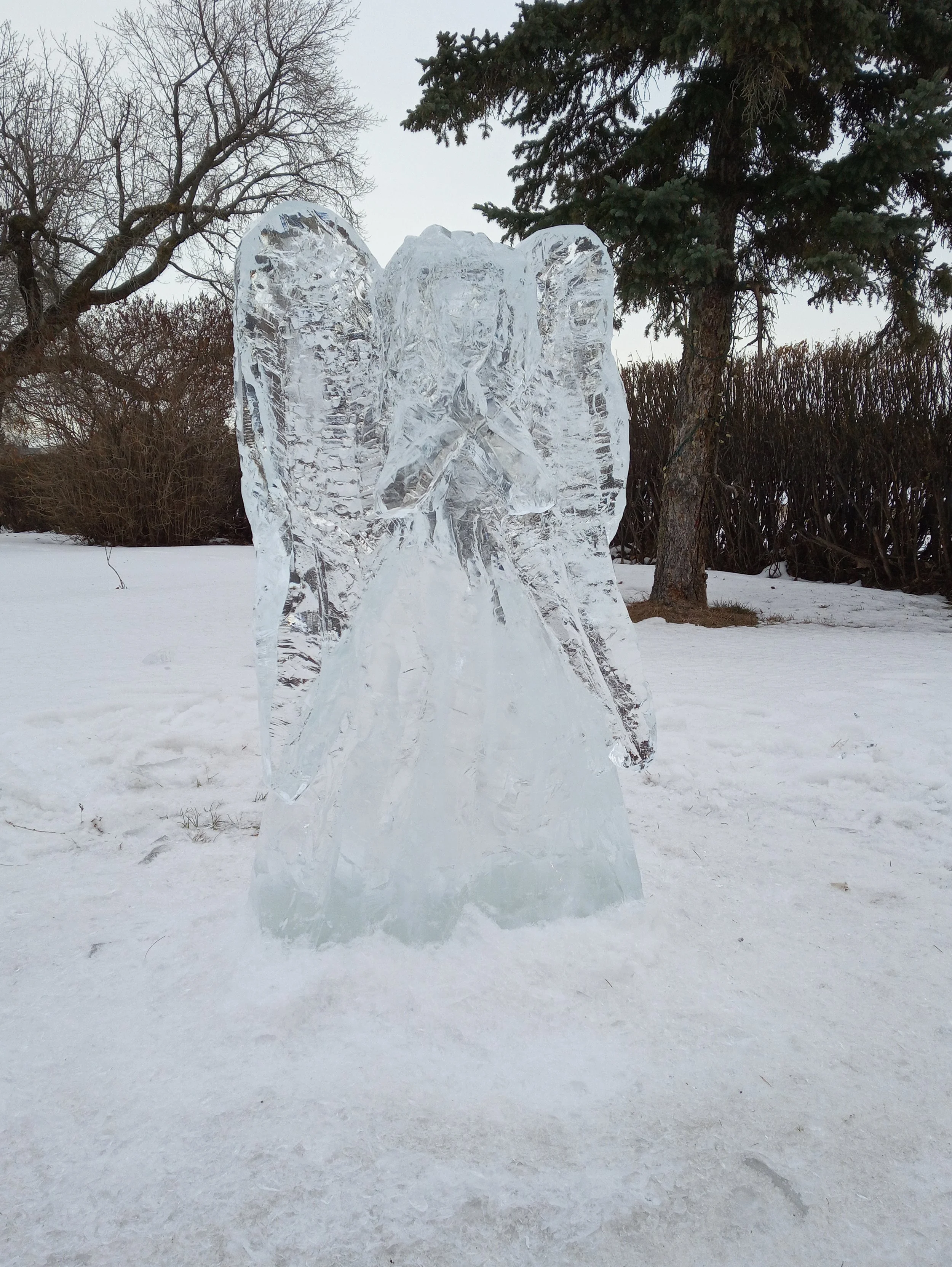 ice sculpture of angel at christmas in the heartland 2023