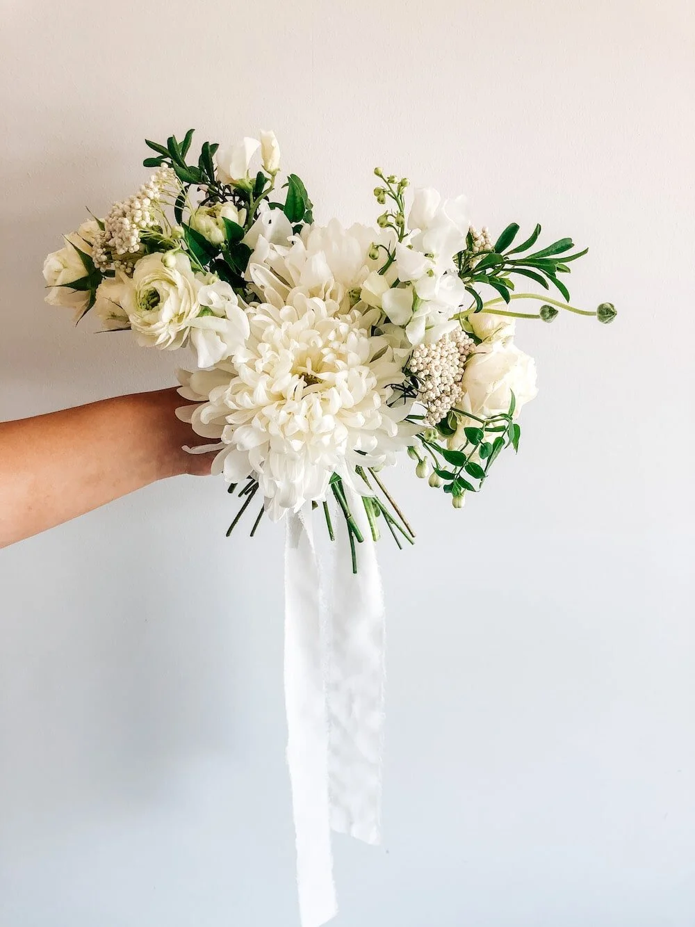 White and green bridesmaid bouquet