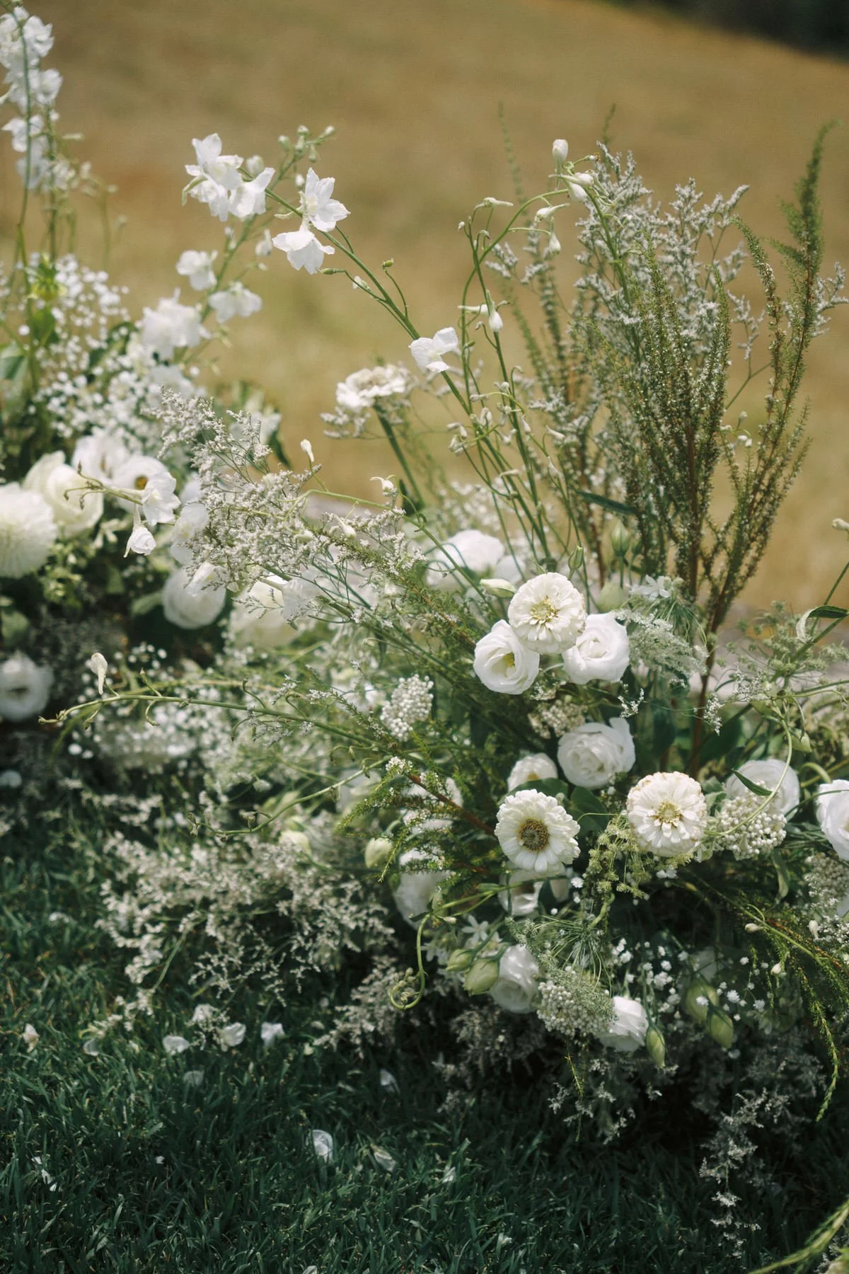 Meadow-inspired ceremony flowers