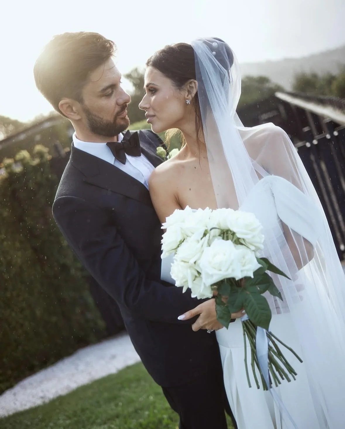 Bride and groom portrait at sunset.