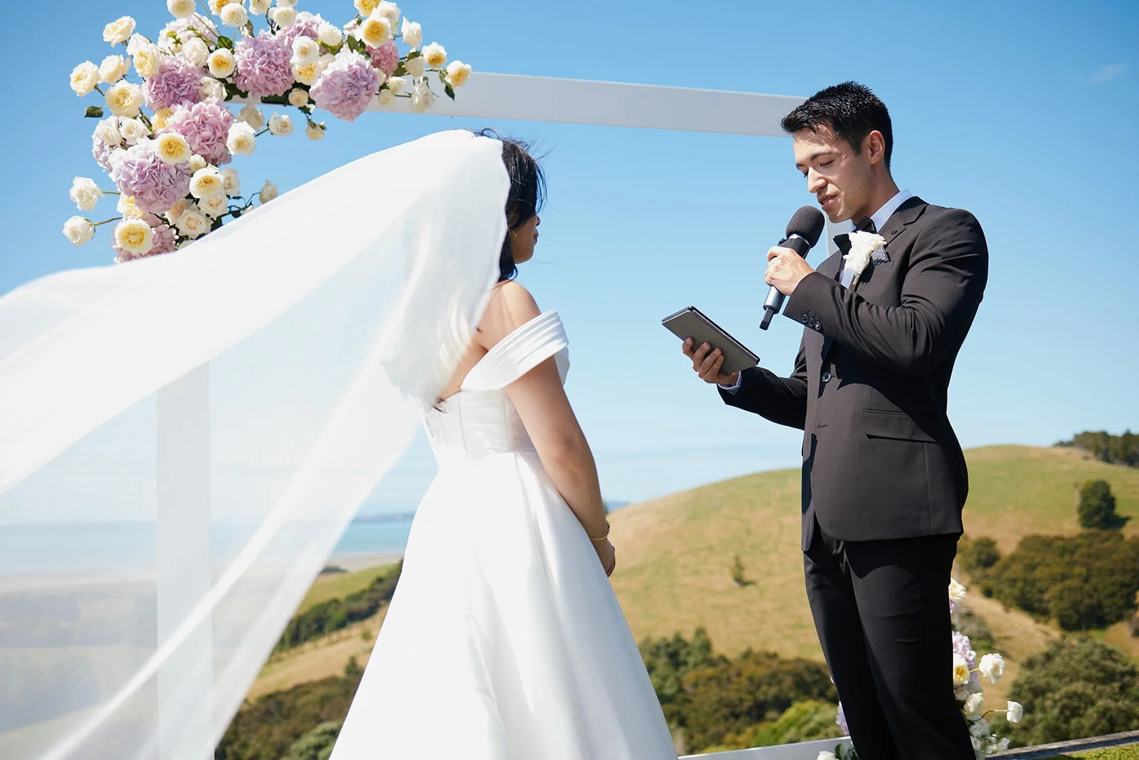 Veil blowing during vows