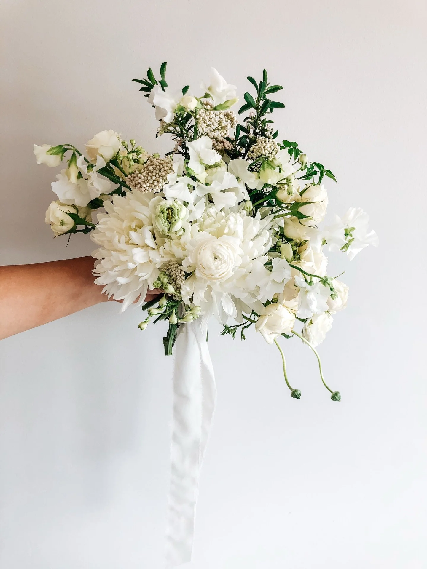 One of my early favourites! 

An all white bridal bouquet from FIVE years ago, and still as timeless as ever🤍

Proof that soft texture, intentional shape, and a neutral palette never go out of style. 

#modernromanticwedding #timelesswedding #whitew