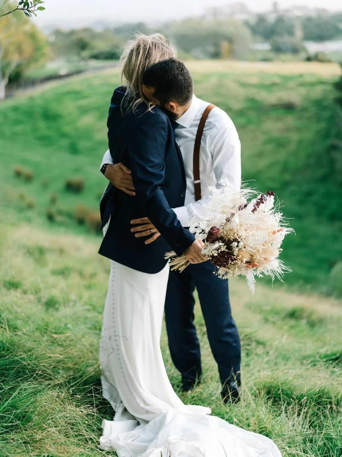 Still one of my favourite wedding moments. 🤍

There&rsquo;s so much tenderness in this photograph&mdash;and tucked into the moment is a dried bridal bouquet filled with soft ivory, blush and deep berry tones.

The coordinating buttonhole carried the