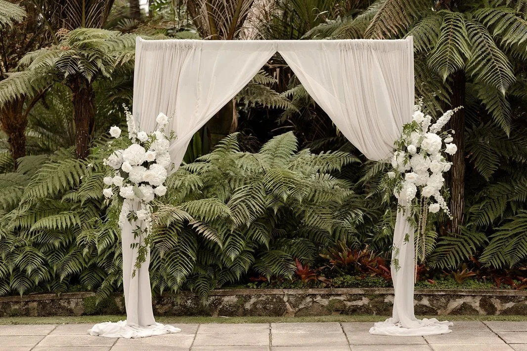 There is something so timeless about an all-white wedding.

For Pelin &amp; Matt, we wanted every floral moment to feel soft, elegant and effortless. Layers of white blooms framed the ceremony, a bouquet of classic white roses complemented the clean 
