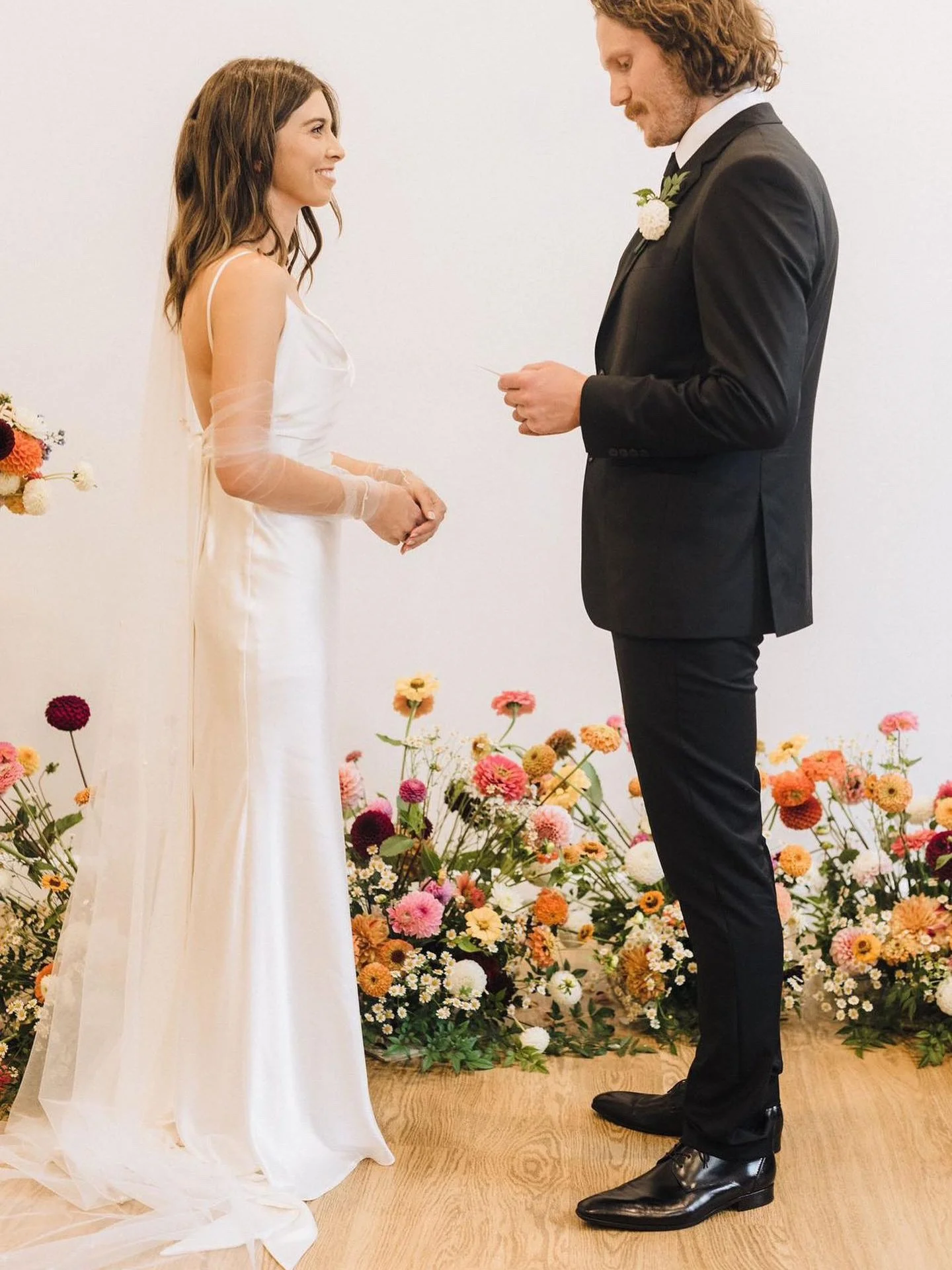 A little wild, a little whimsical, and full of colour 🌸

Garden-style florals spilling along the ceremony aisle in shades of pink, apricot, butter yellow and deep berry &mdash; designed to feel loose, abundant and as though they had simply grown the