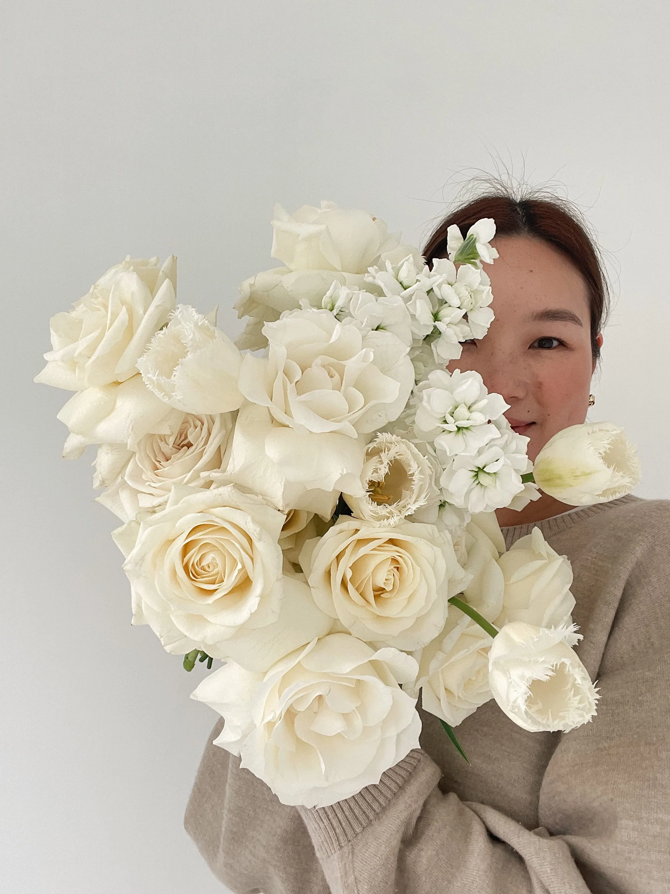 Amber from FlowerMe, Auckland wedding florist and floral designer.