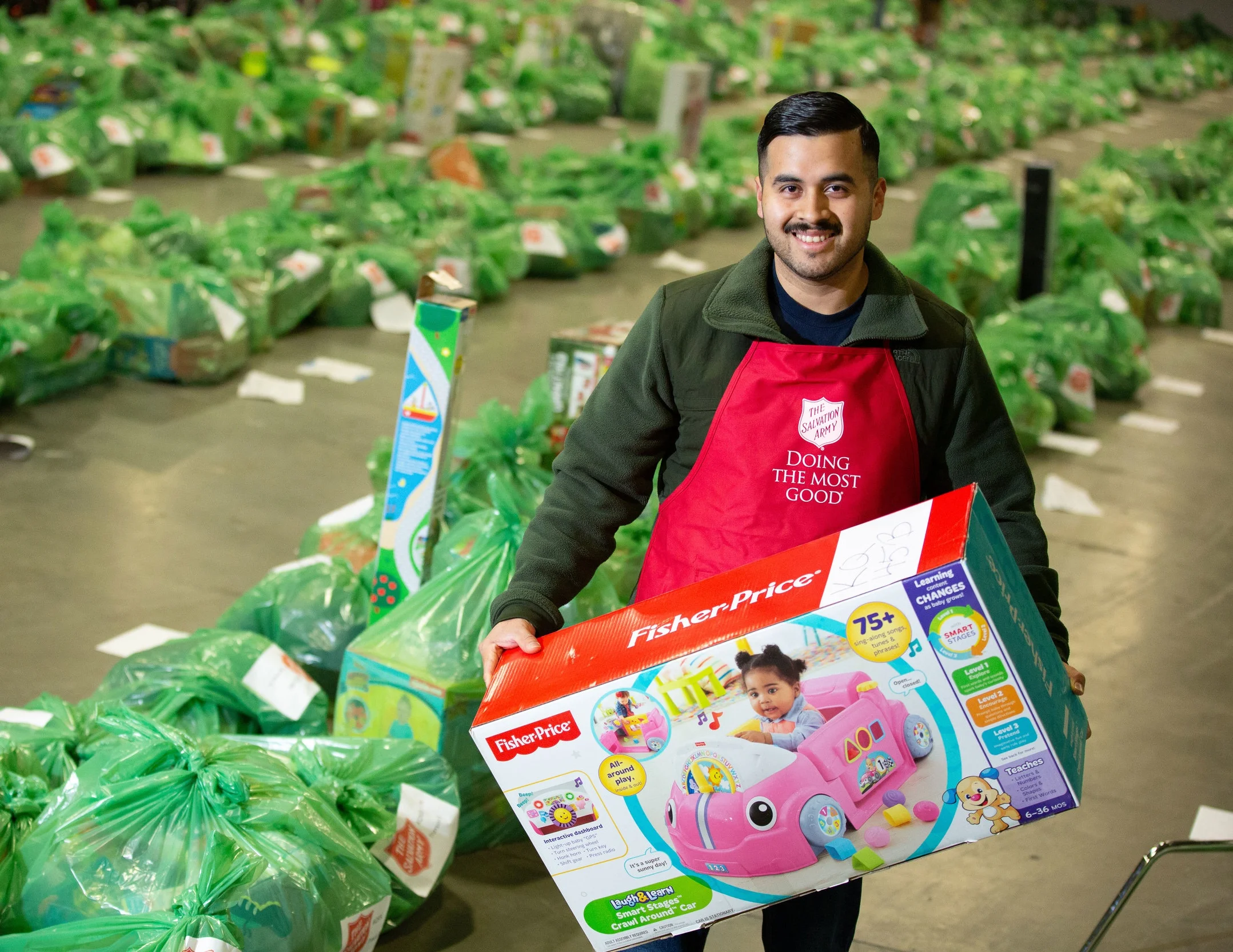 volunteer-holding-gift.jpg