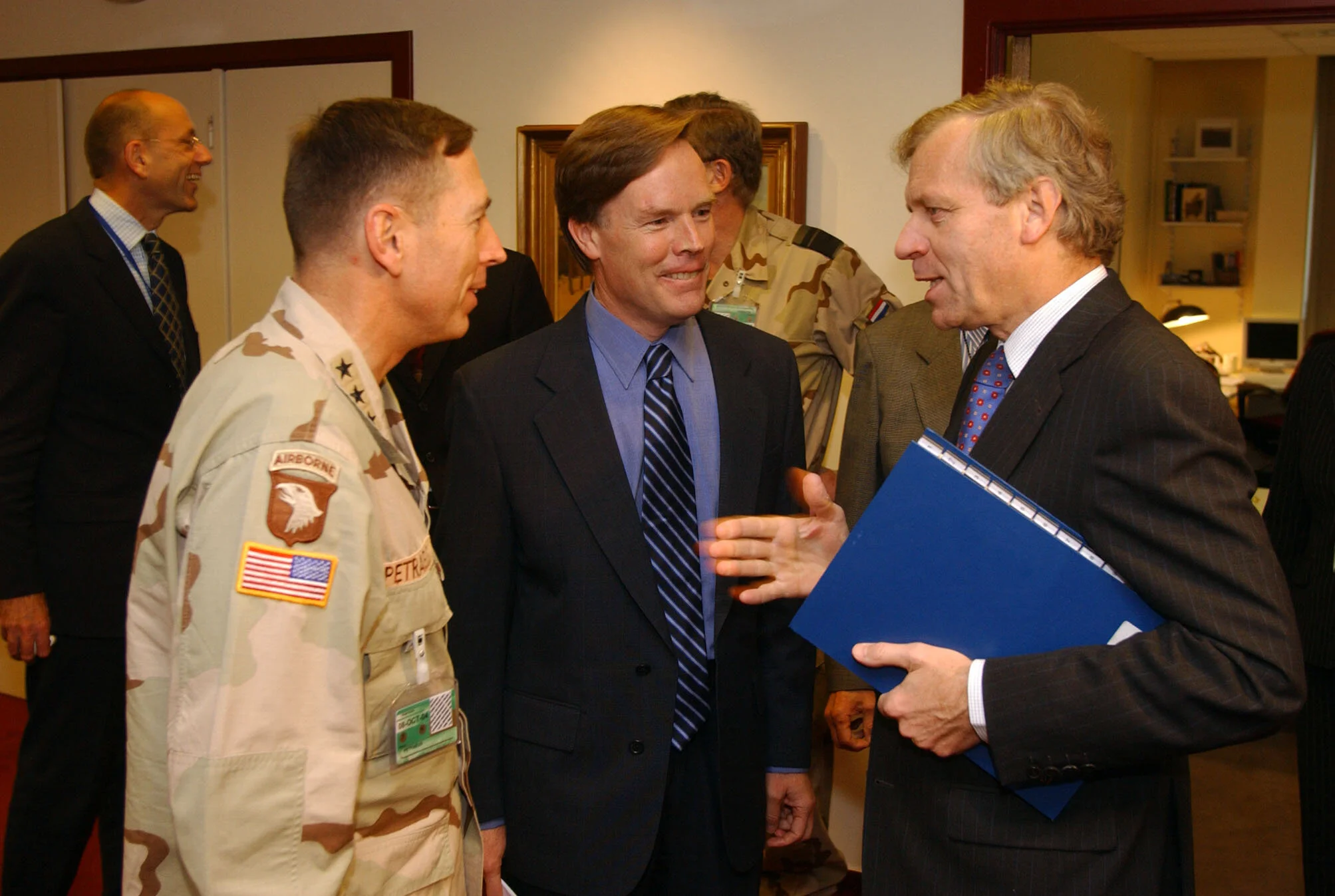 Burns, center, with Lieutenant General D. Petraeus, left, and NATO Secretary General, Jaap de Hoop de Scheffer.