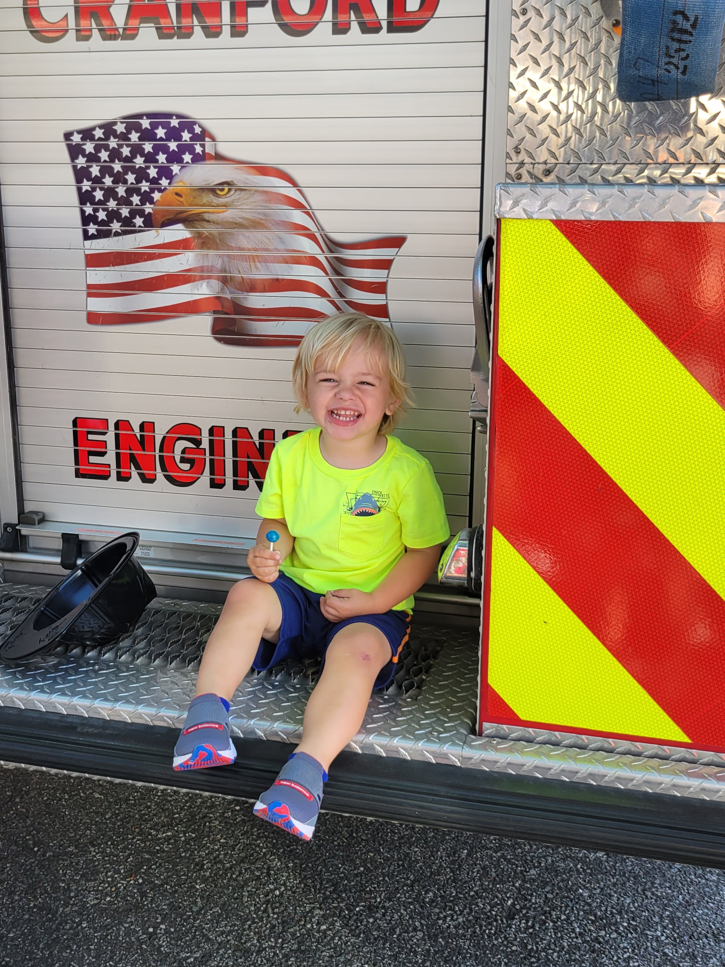 Boy on fire truck.jpg