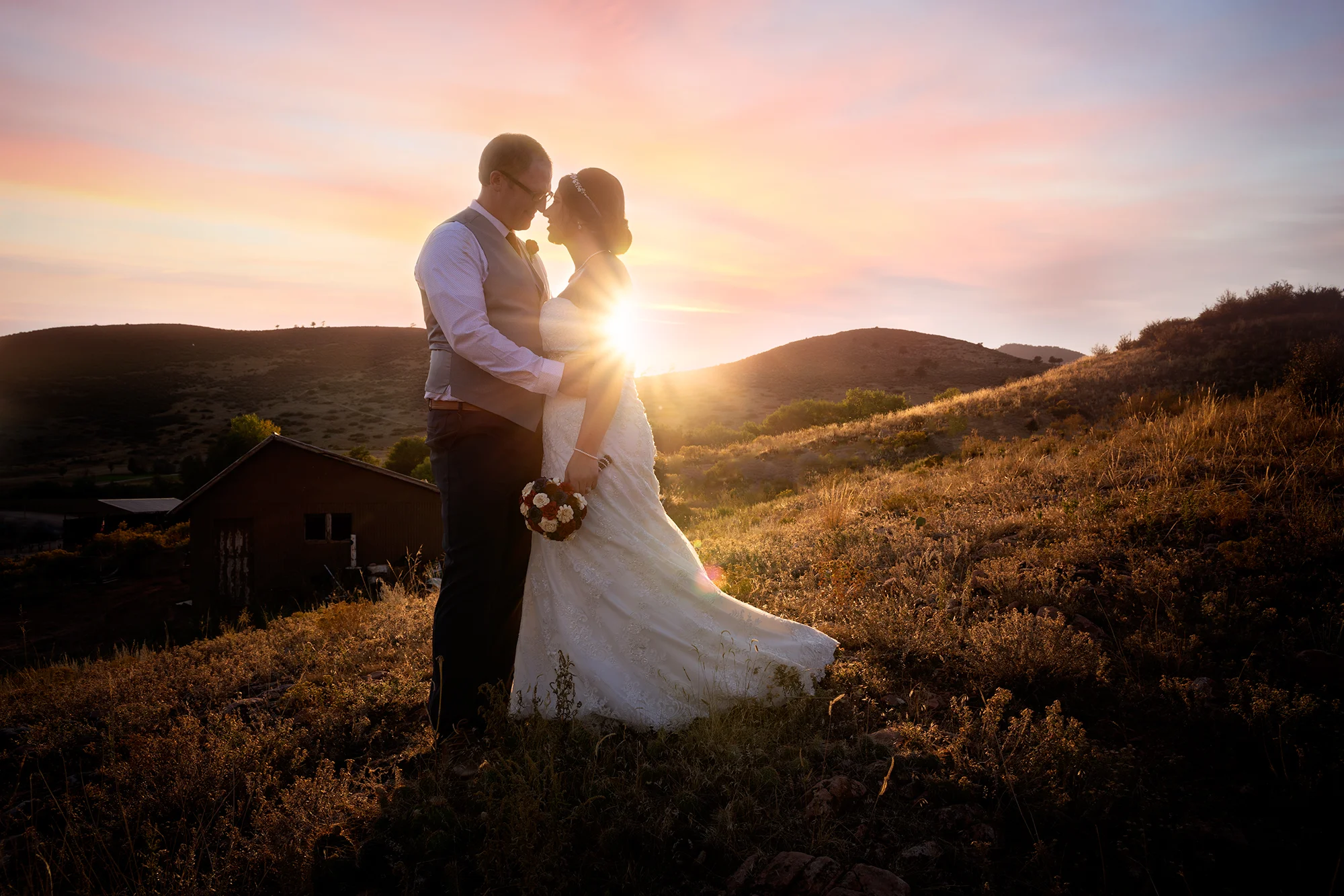 Bride and groom at sunset in Loveland, Colorado | Lesley Leigh Photography |