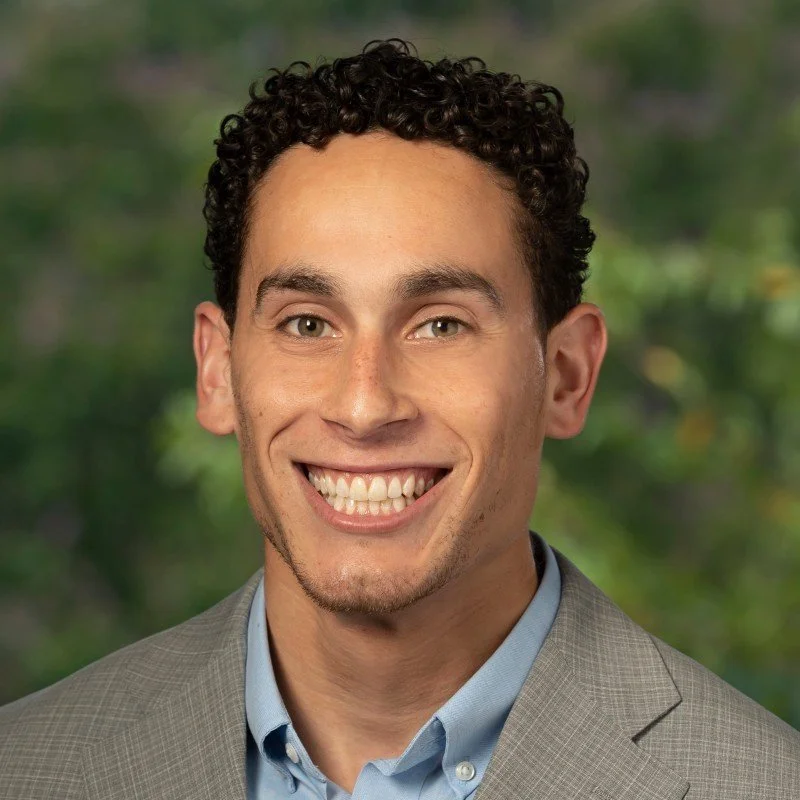 JORDAN WILSON, Board Member