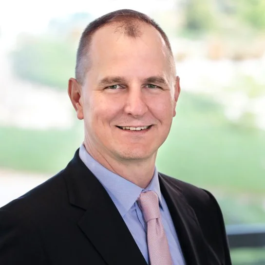 JOHN BROCKLAND, Board Member