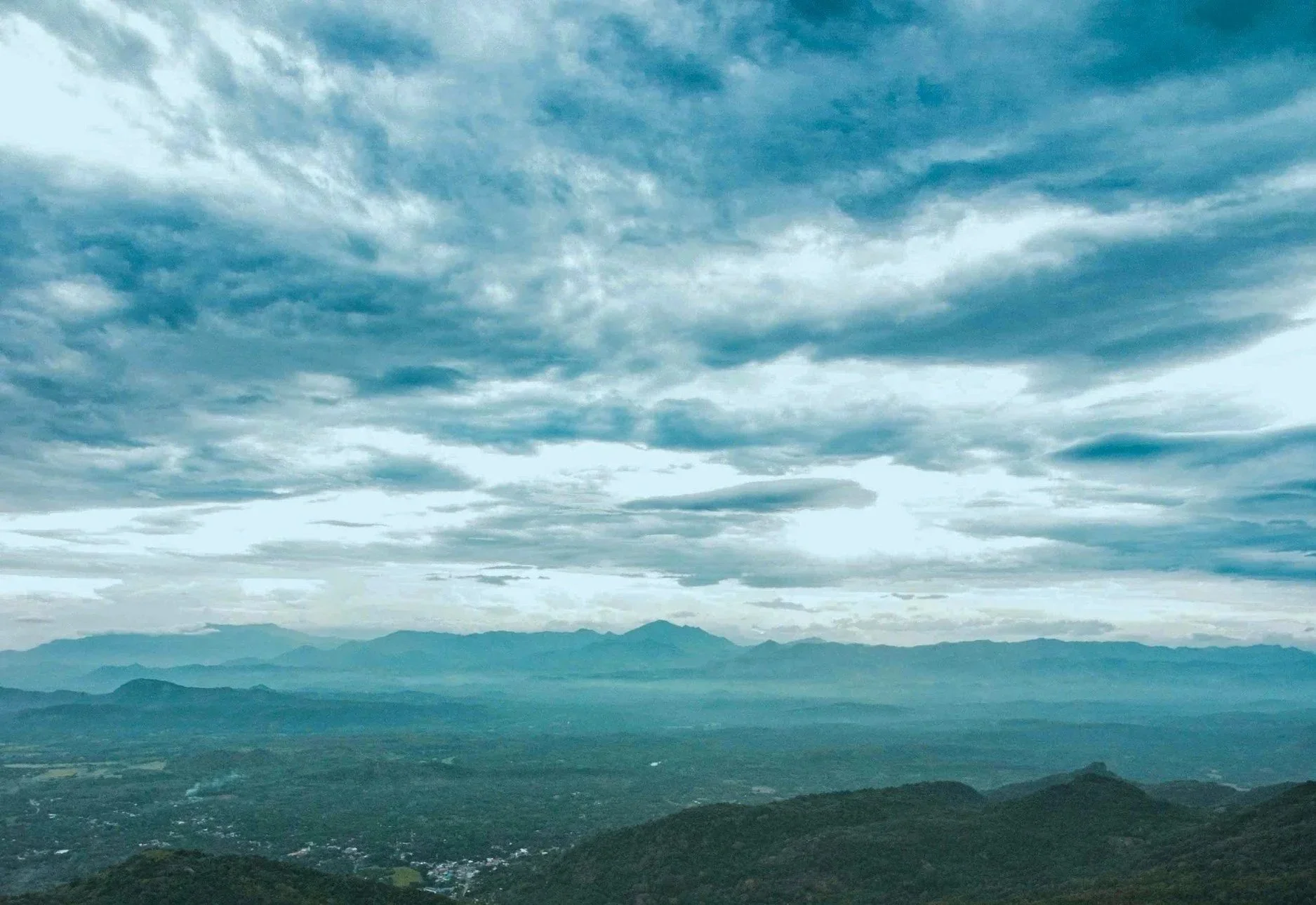 Debra Hart Studio teal blues sky with mountains in background acrylic landscape