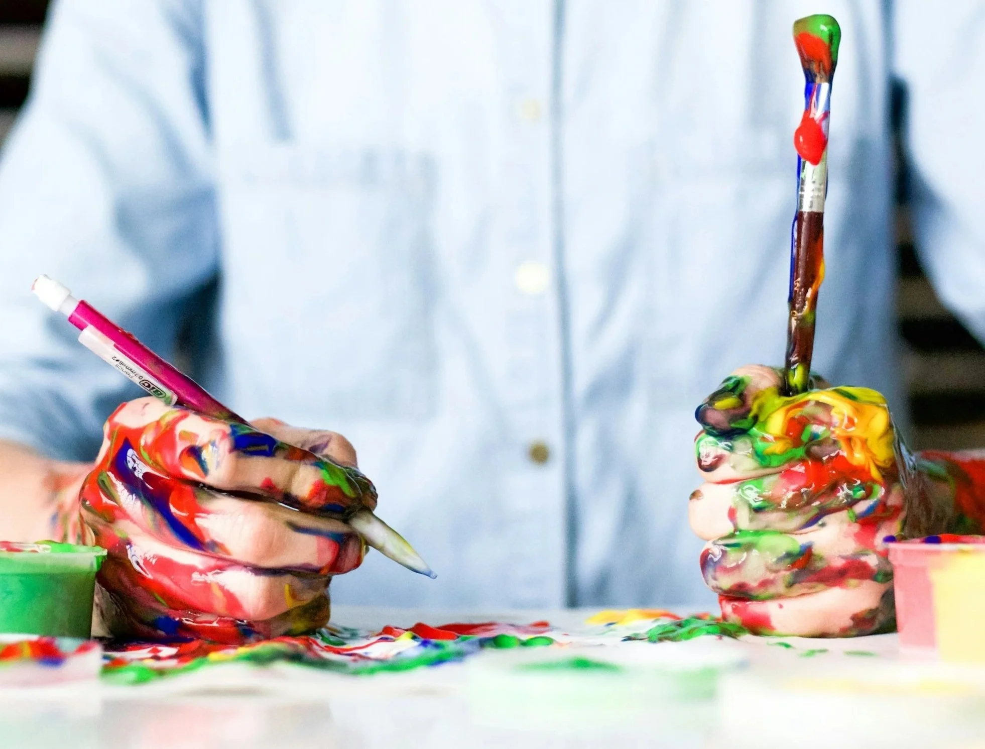 Paint messy hands and brushes Debra Hart Studio