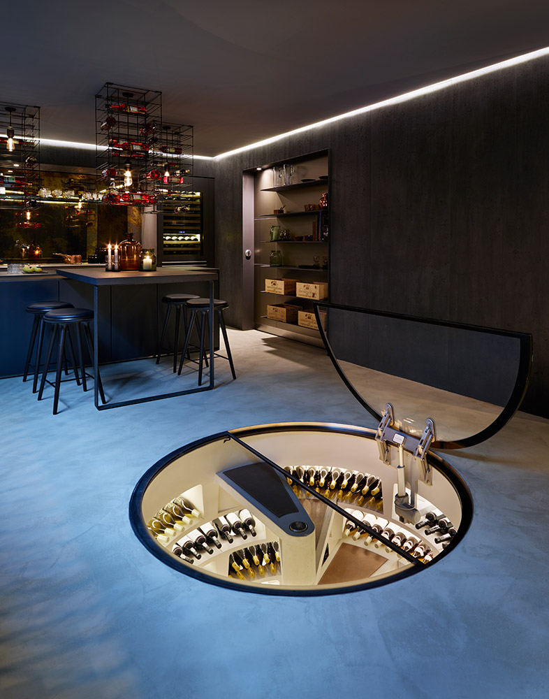 White-Spiral-Cellar-and-Hinged-Round-Glass-Door-Kitchen-Architecture-London-06.jpg