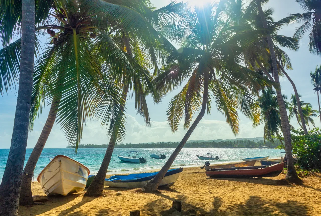 las terrenas beach with boats.webp