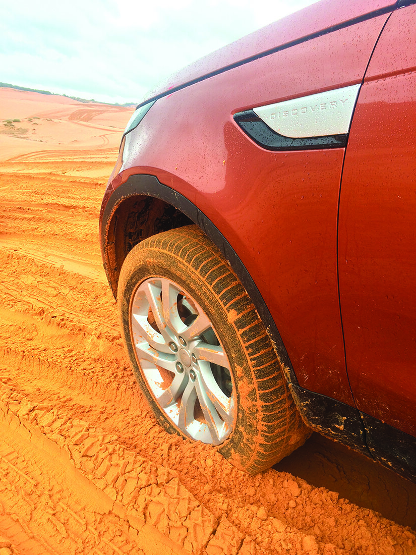 Driving in the sand at Coral Pink Sand Dunes State Park.jpg
