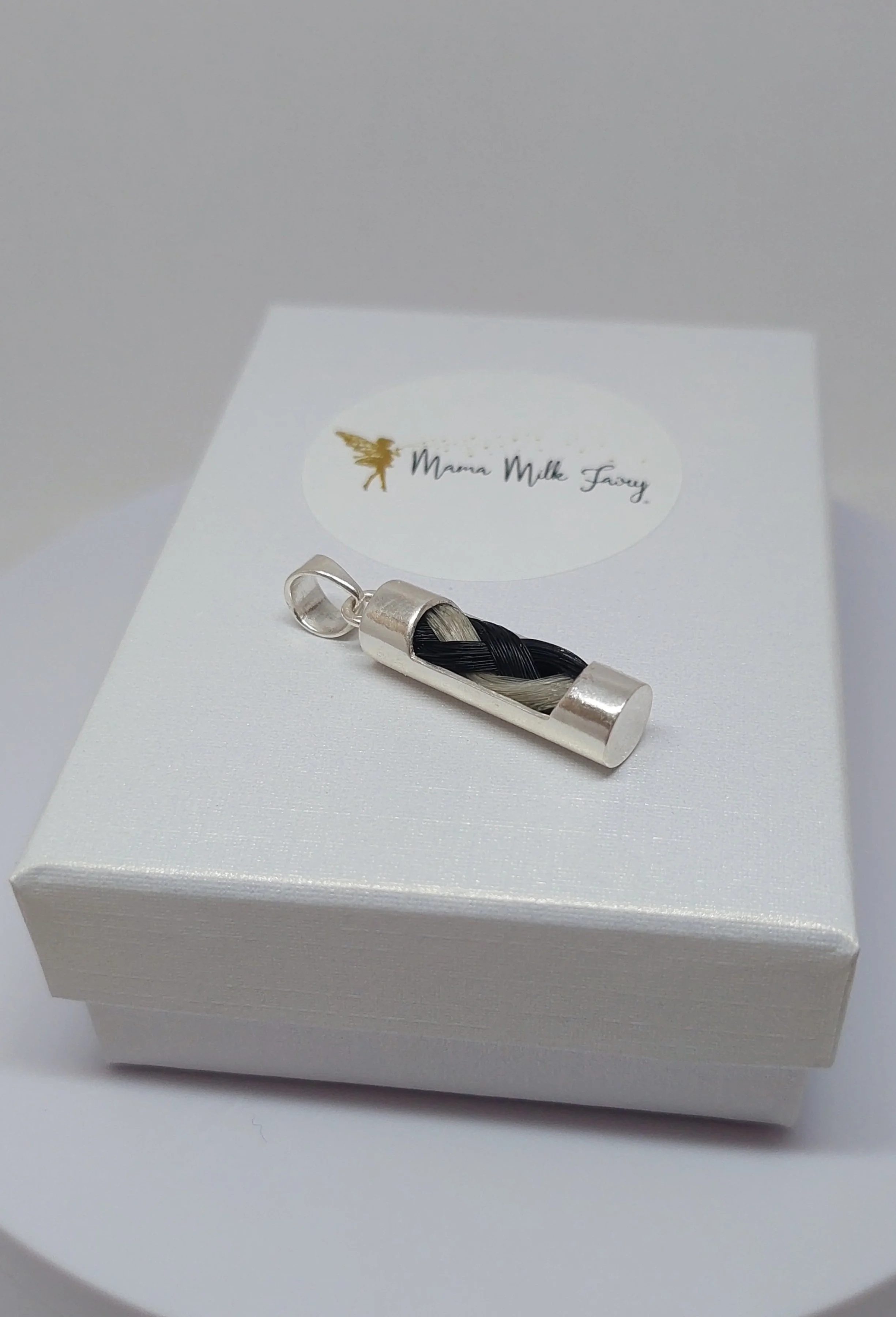 Horse tail tube pendant