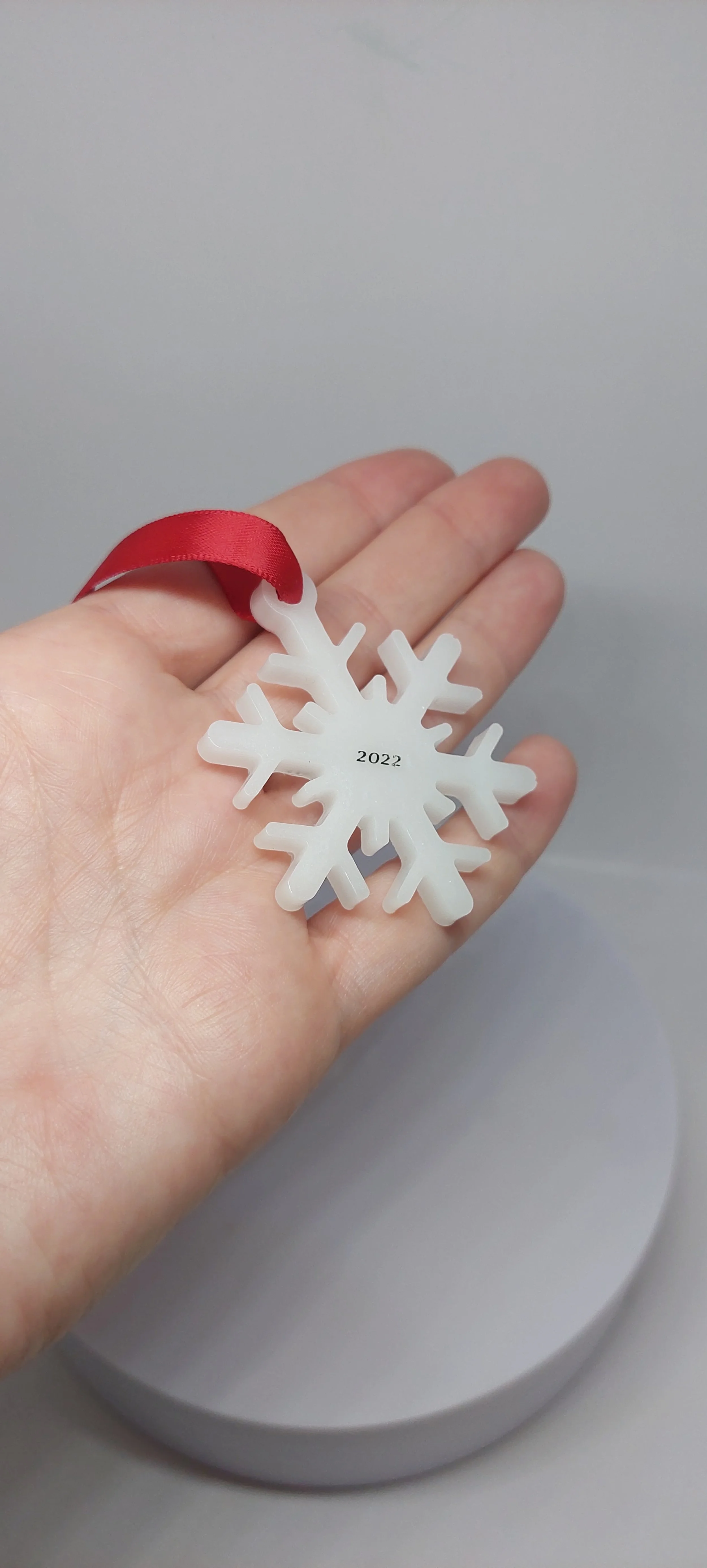 winter figurine made from breastmilk