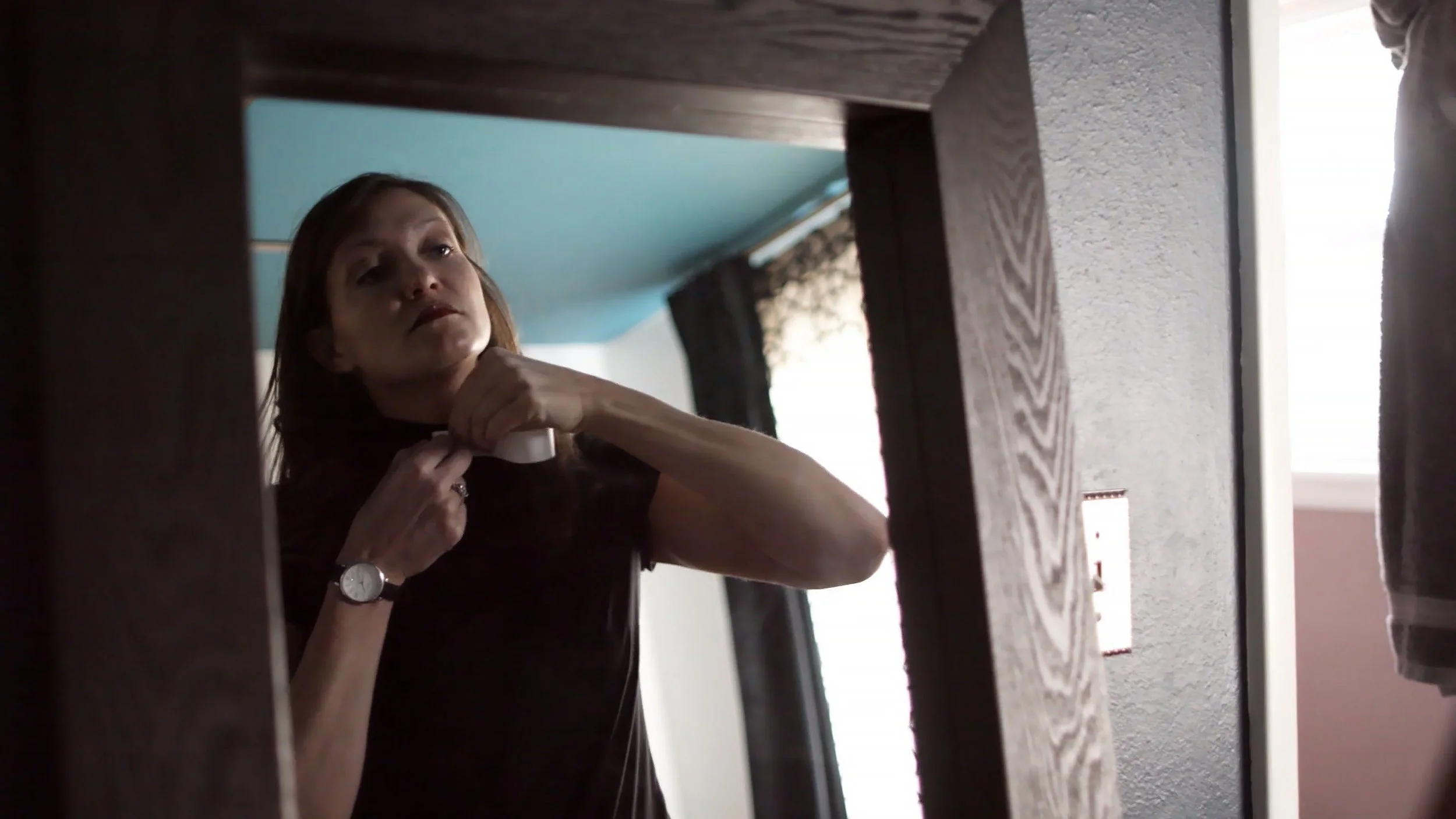 AH-RevLori_PuttingonCollar copy.JPG