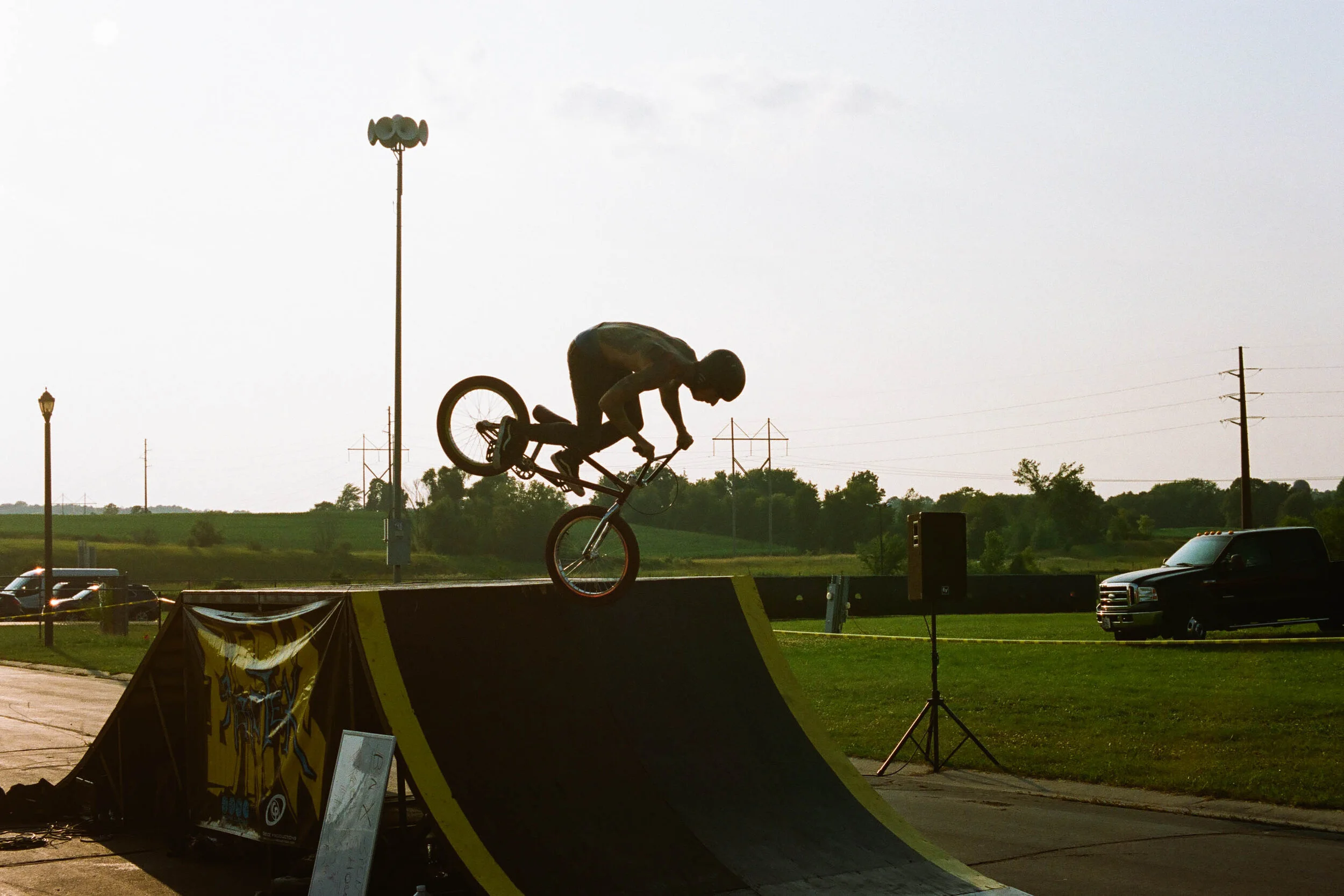  Danny Balister Photography. 35 mm film photo. Port Washington County Fair. Lifestyle. Bike. Silhouette. Ramp. 