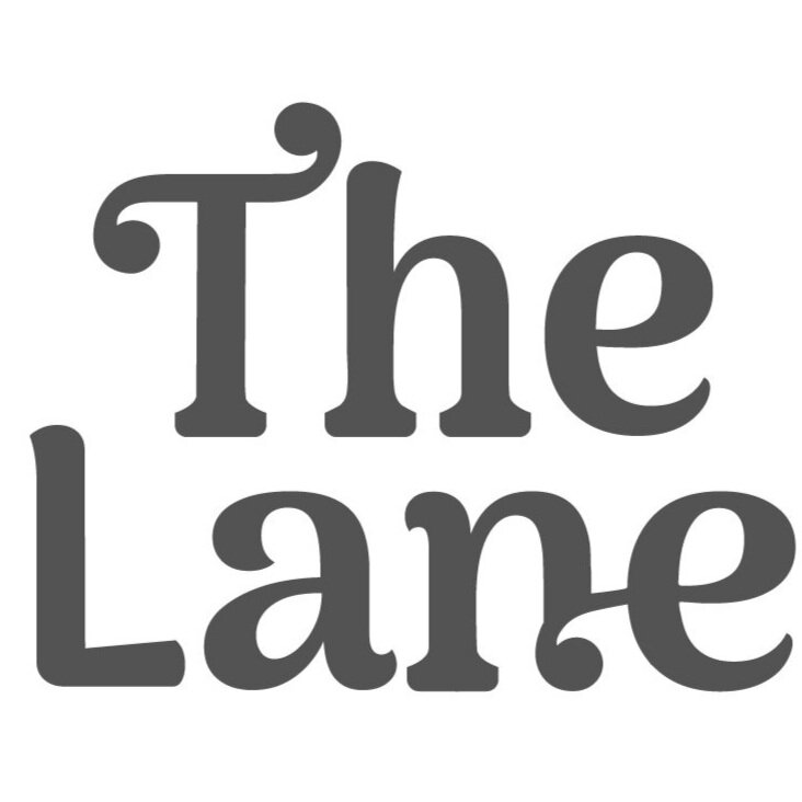 TheLane-Logo_TheLane-Vertical-Emerald.jpg