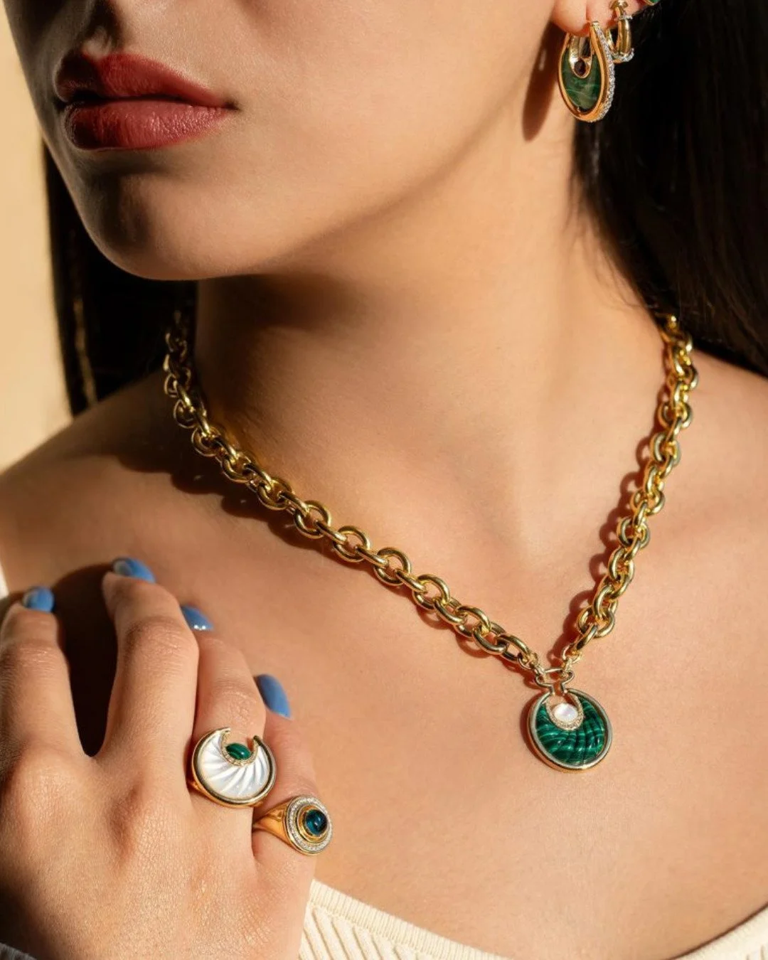 Stacked, coiled, and seriously cool. What else do you want for the perfect styling?

Diana earrings in 3 colors: Amethyst, Malachite and Gold, polished gemstones, diamonds, and 18K gold.
Circus Moon necklace and Circus Moon ring, both available in La
