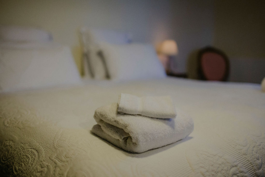 towels on the bed