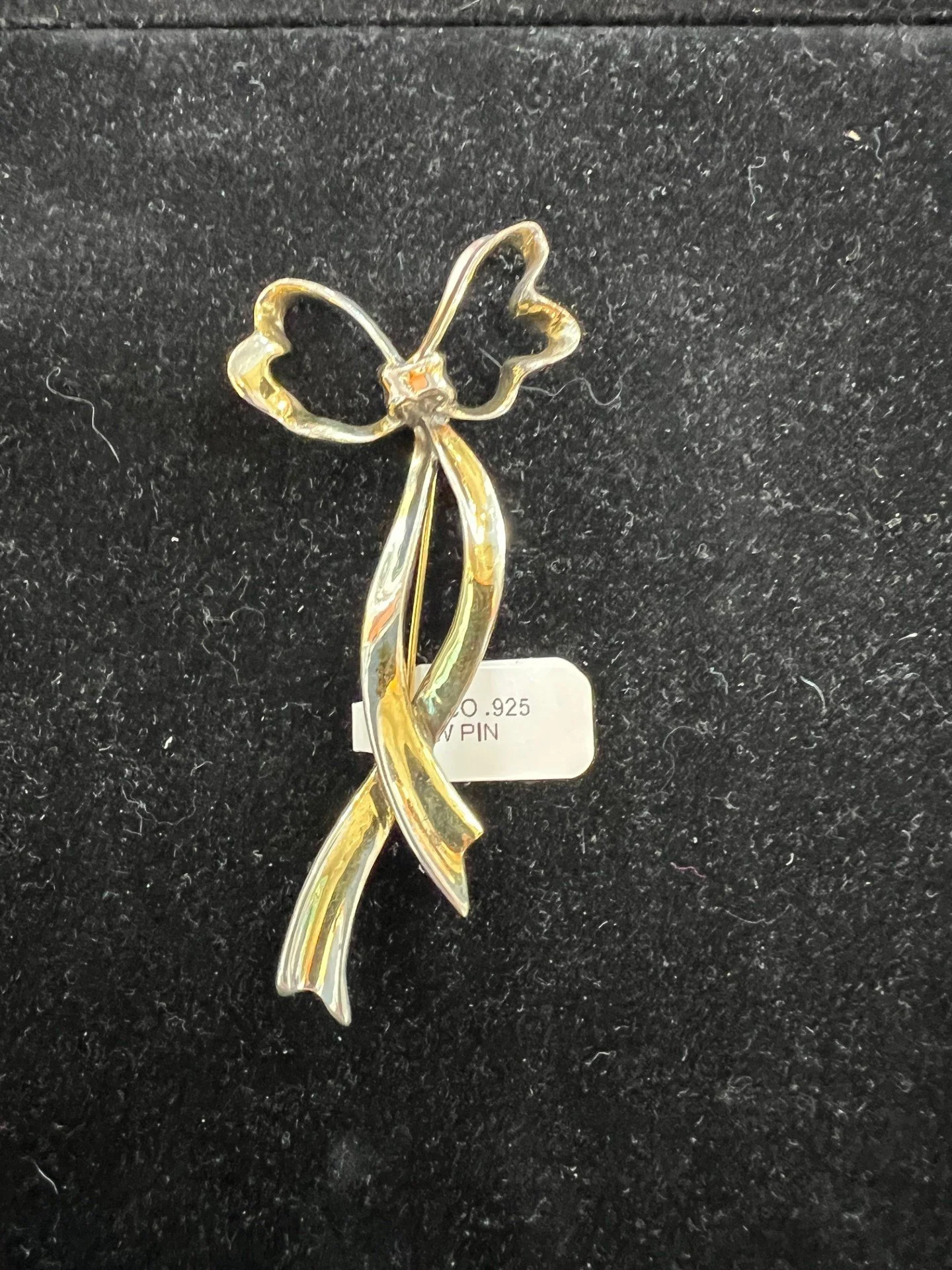 TIFFANY & CO. .925 BOW PIN $295.00