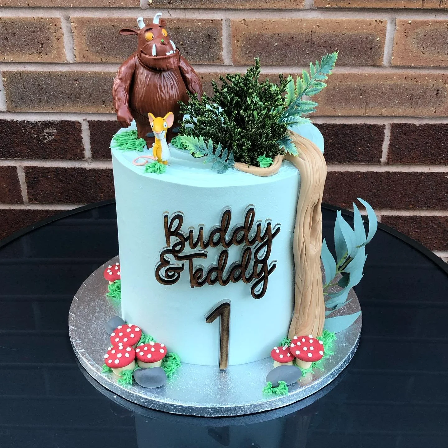 🌳🍄💙 Buddy &amp; Teddy&rsquo;s 1st Birthday💙🍄🌳

How sweet is this Gruffalo cake made for a joint 1st birthday party 🥹🫶🏻

**inspired by a design from another cake maker but not sure of their @ 

#cake #gruffalocake #gruffalo #birthdaycake #bir