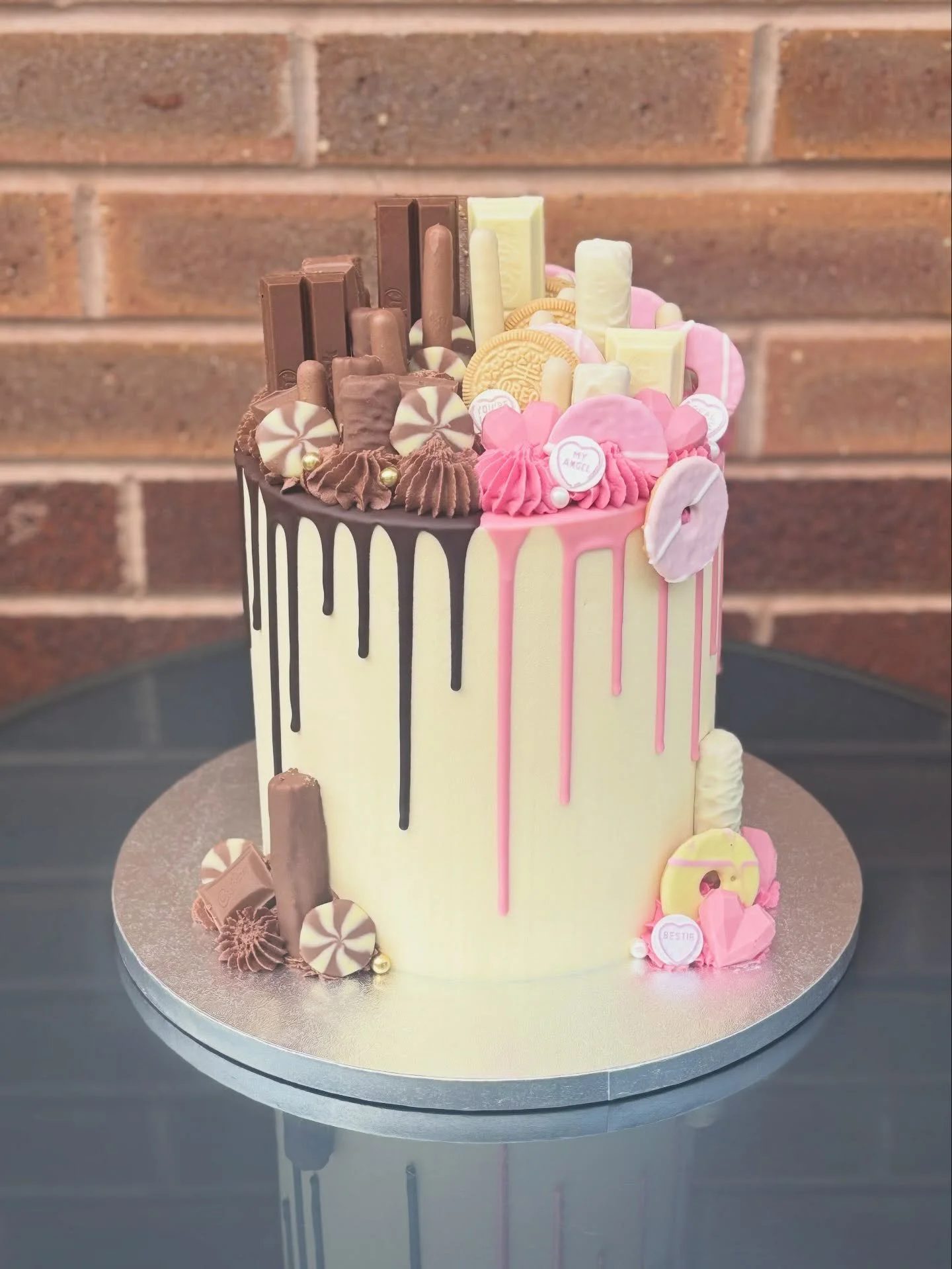 Still absolutely love a drip cake even if they&rsquo;re not trending anymore! 🩷🤍🤎

This was so fun to make, but so glad I&rsquo;m lactose intolerant otherwise I would&rsquo;ve eaten ALLLLL of the leftover chocolates from this cake 🤣🥲

#cake #dri