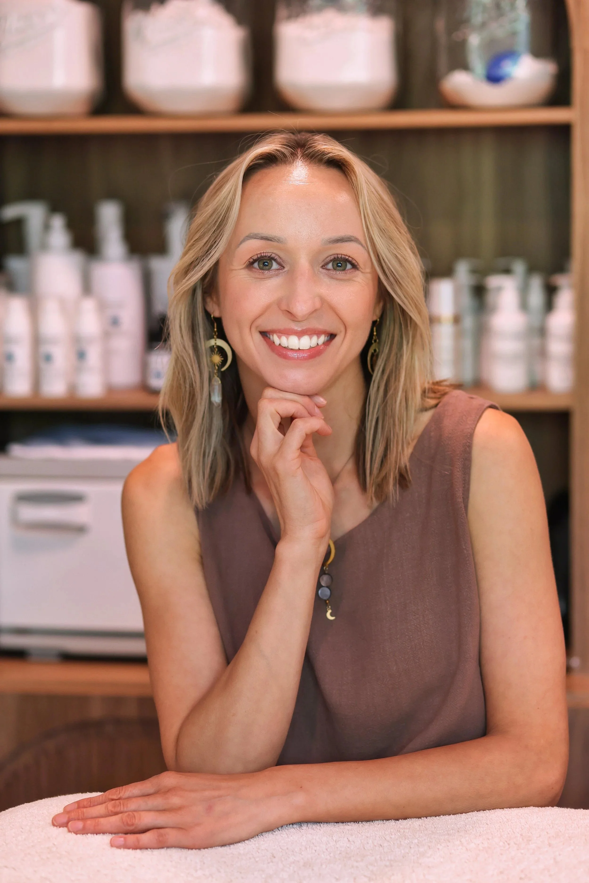 Paulina Iannotta, holistic esthetician in her Naperville skincare studio.