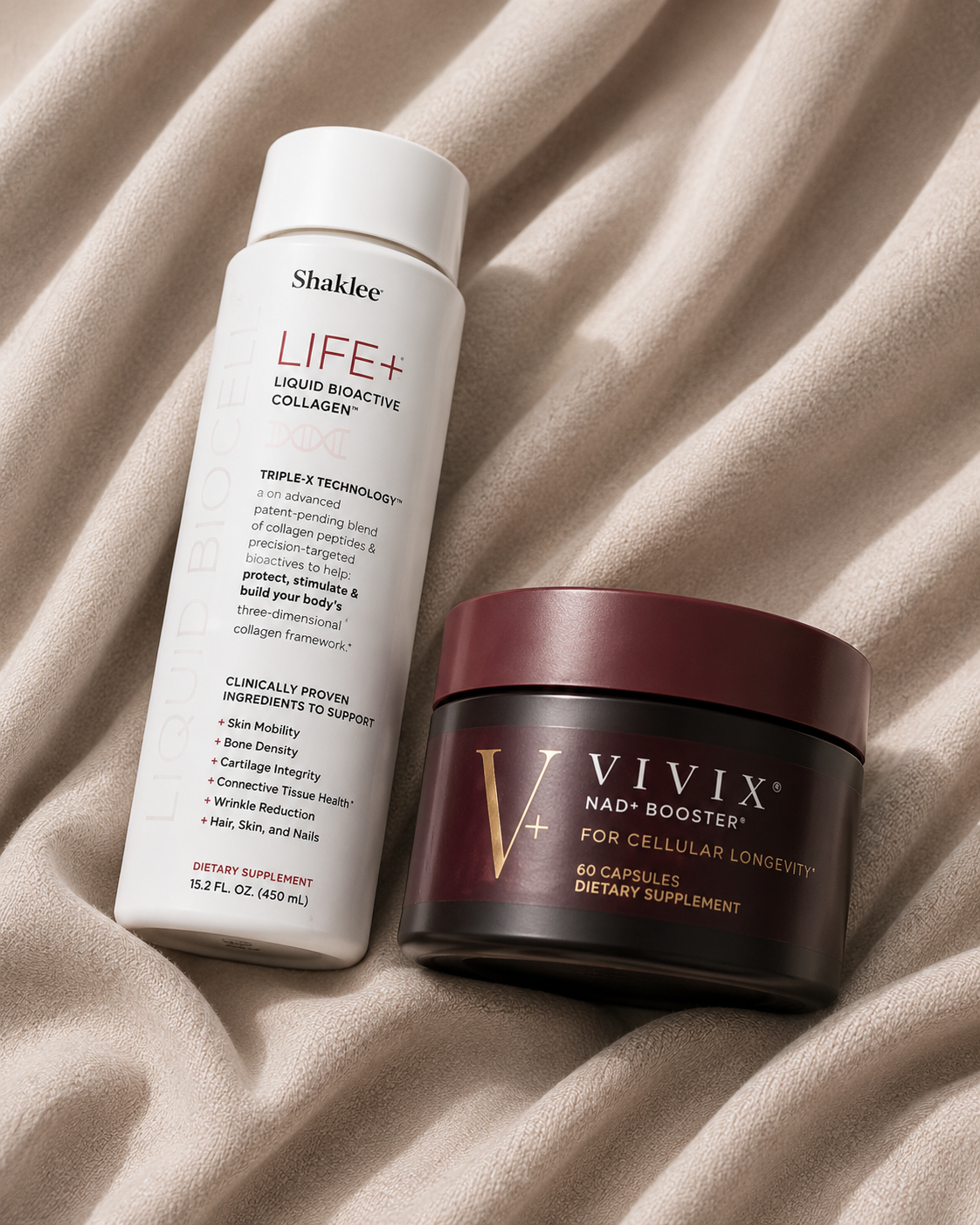 Shaklee LIFE+ Liquid Bioactive Collagen and Vivix NAD+ Booster on neutral fabric