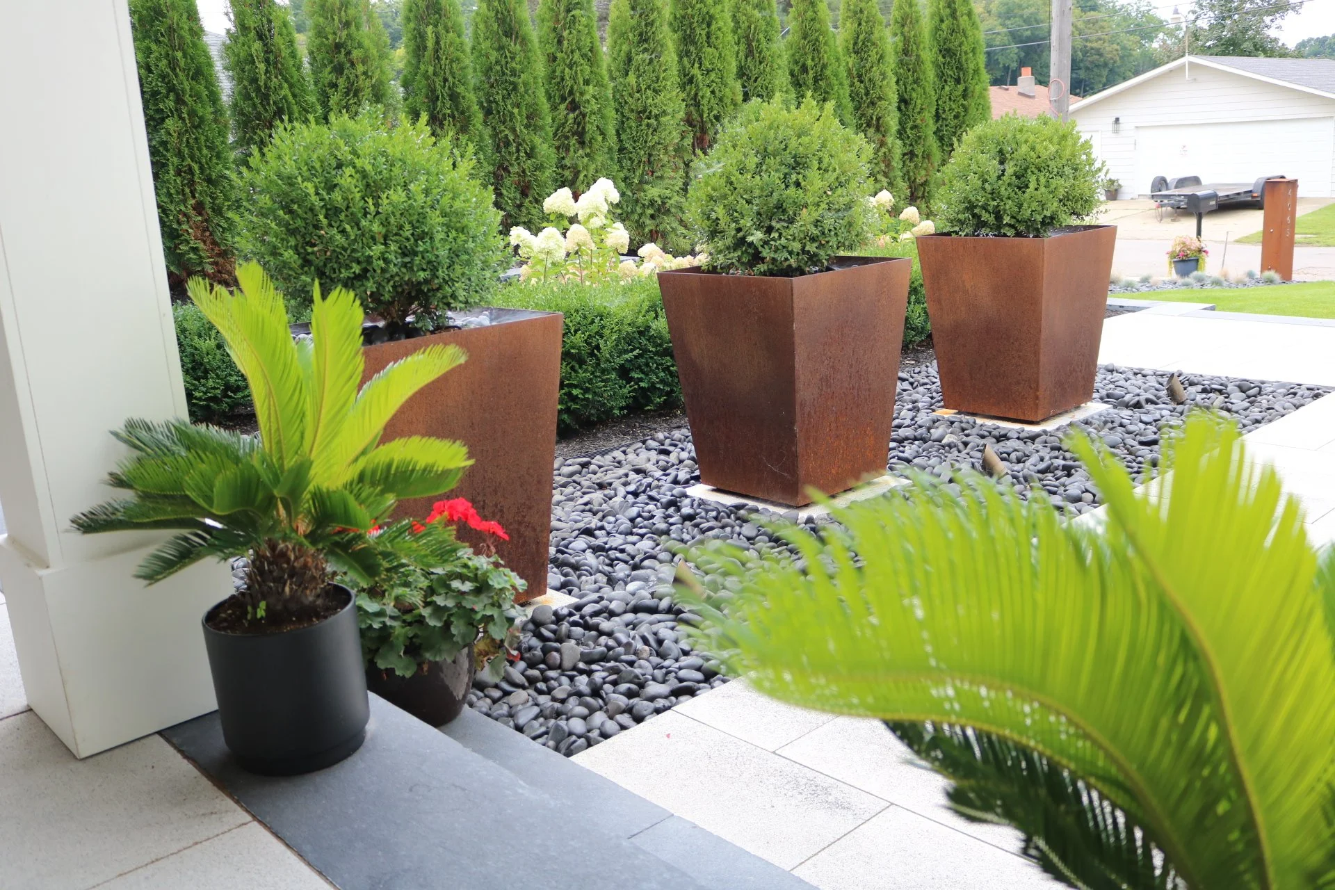 Plantings in Ann Arbor and South Lyon, MI: The Role of Blooming Borders in Enhancing Your Walkway's Design