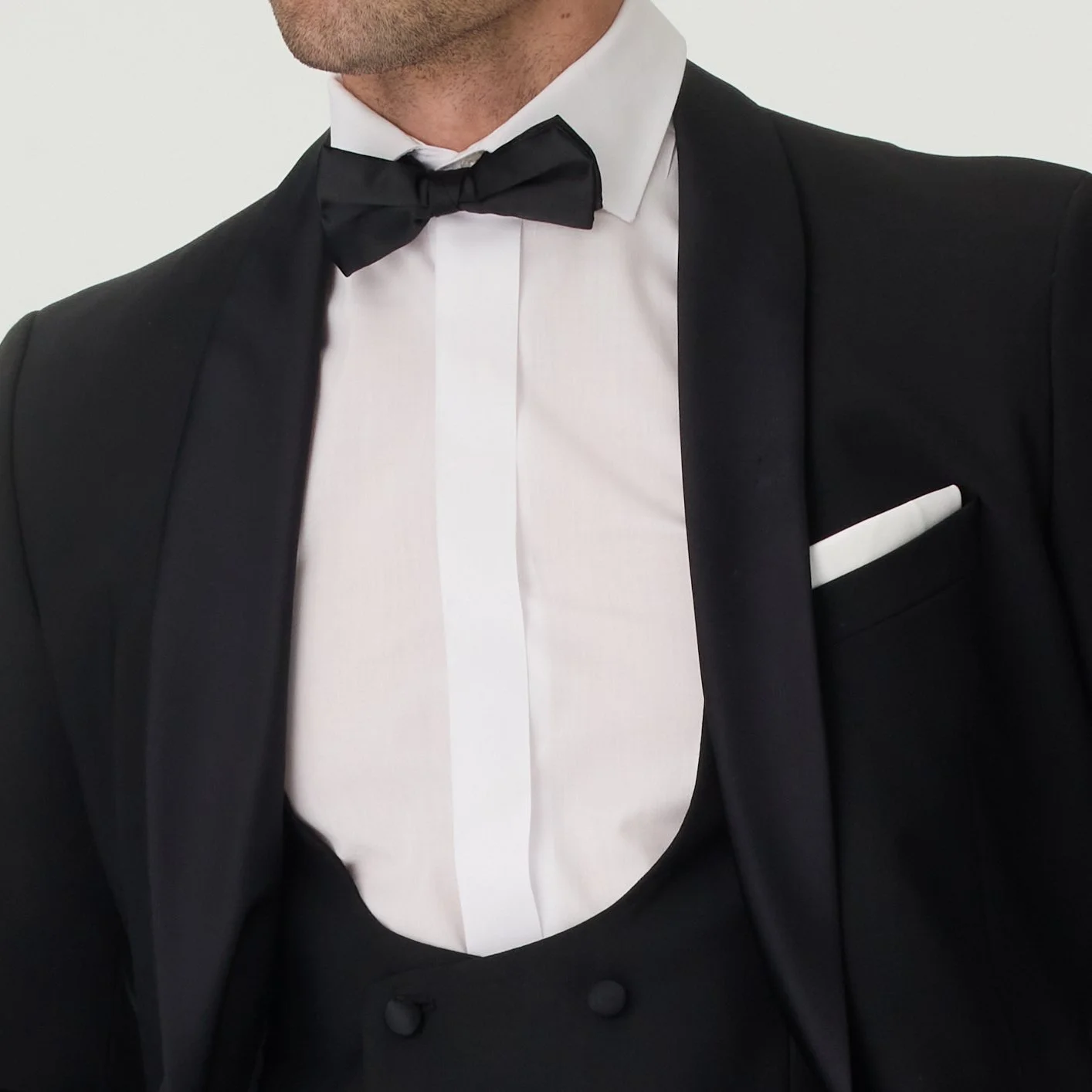 Close up of mens tuxedo on white background